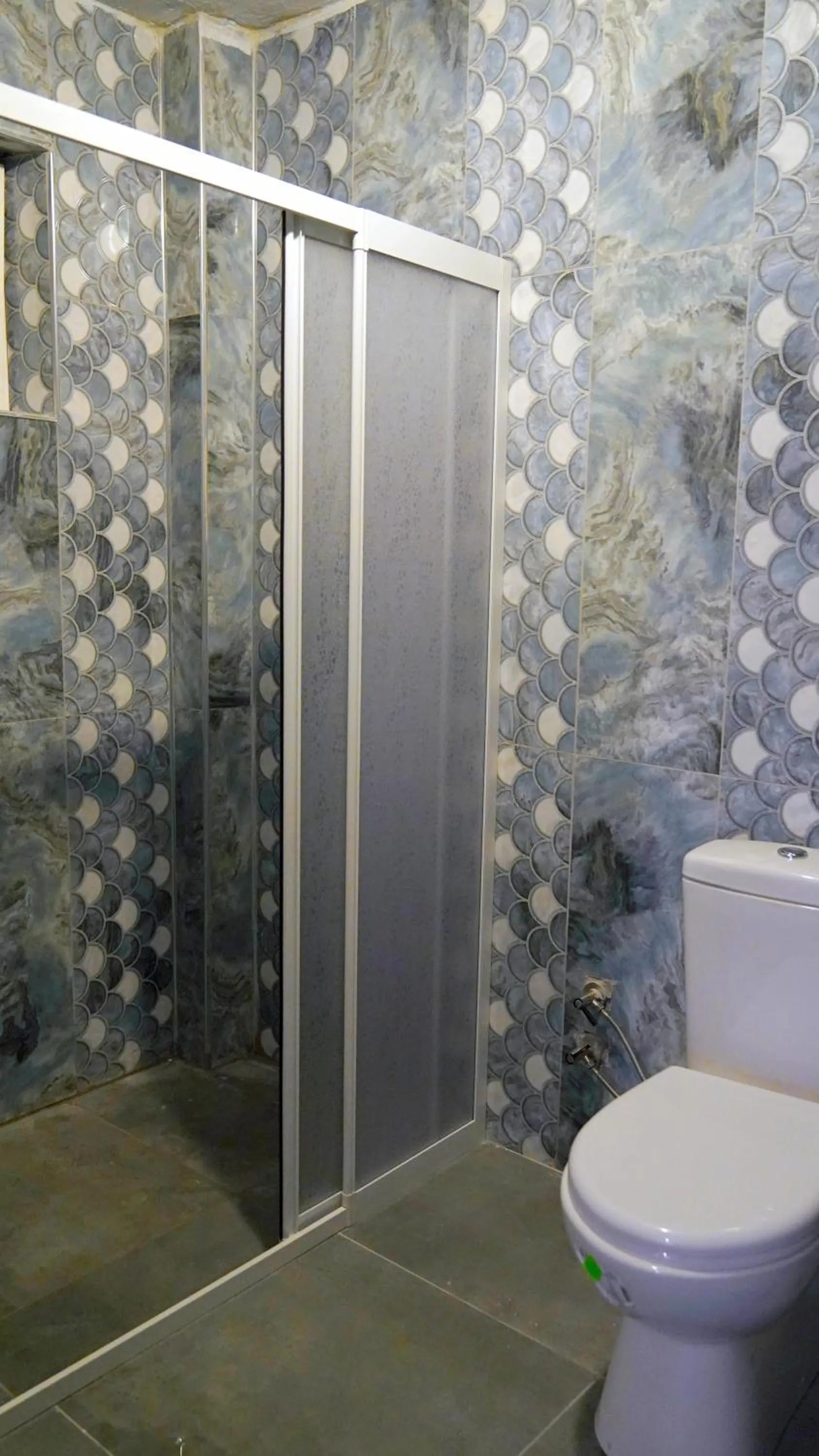 Shower in Alpha Stone House