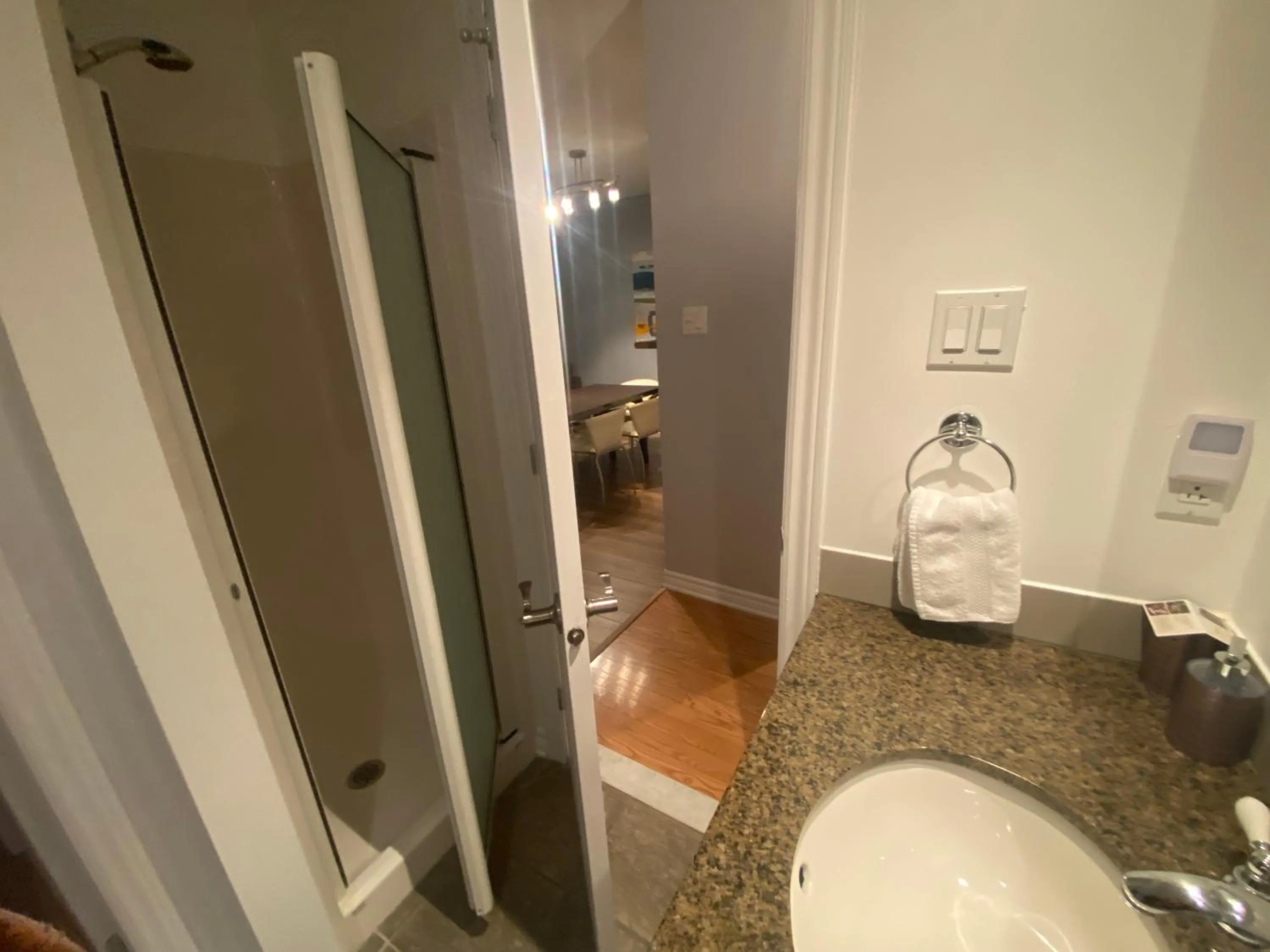 Shower in ApartHotelMontreal by Les Terrasses Saint Urbain 2225I2