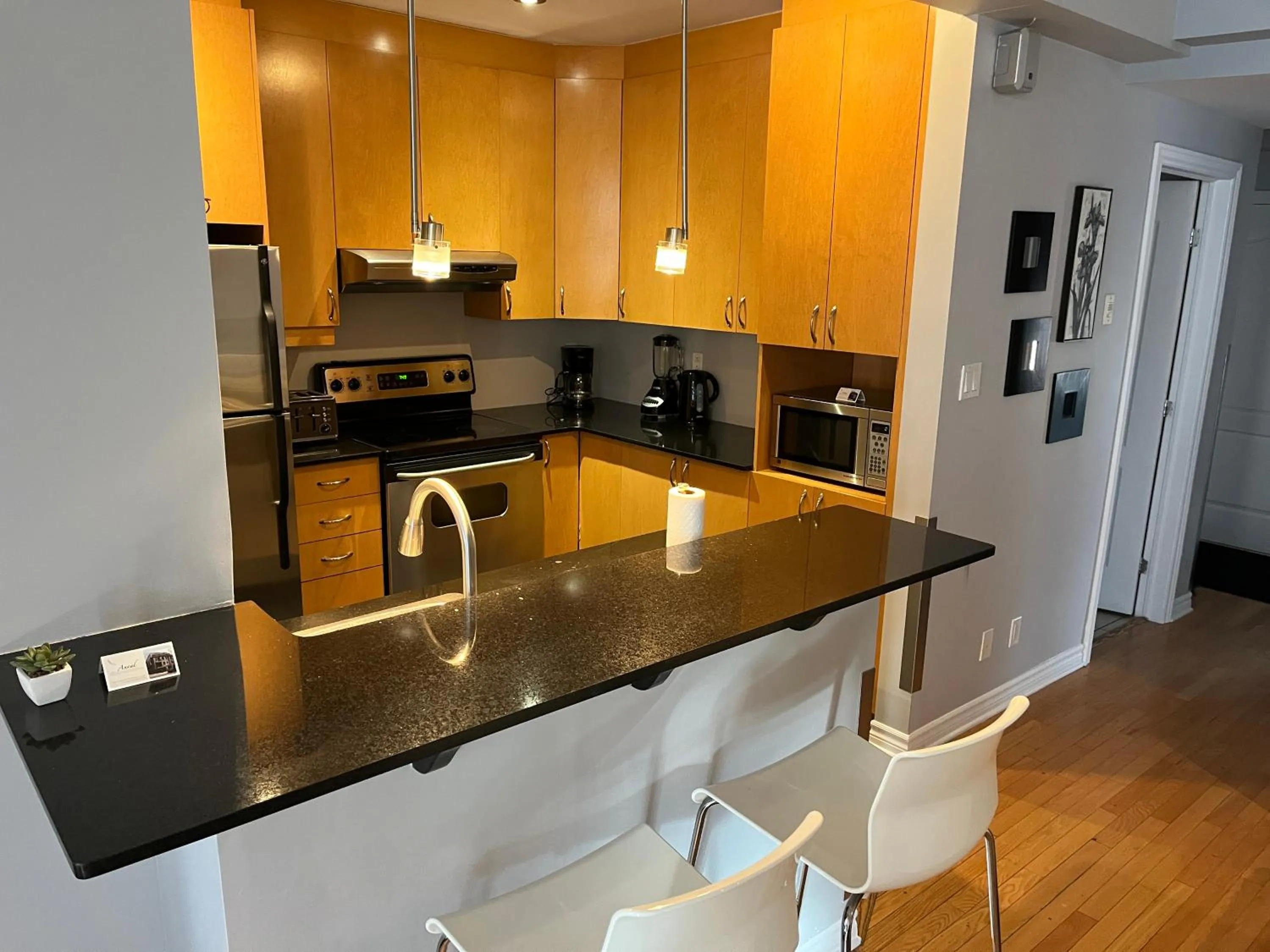 kitchen in ApartHotelMontreal by Les Terrasses Saint Urbain 2225I2