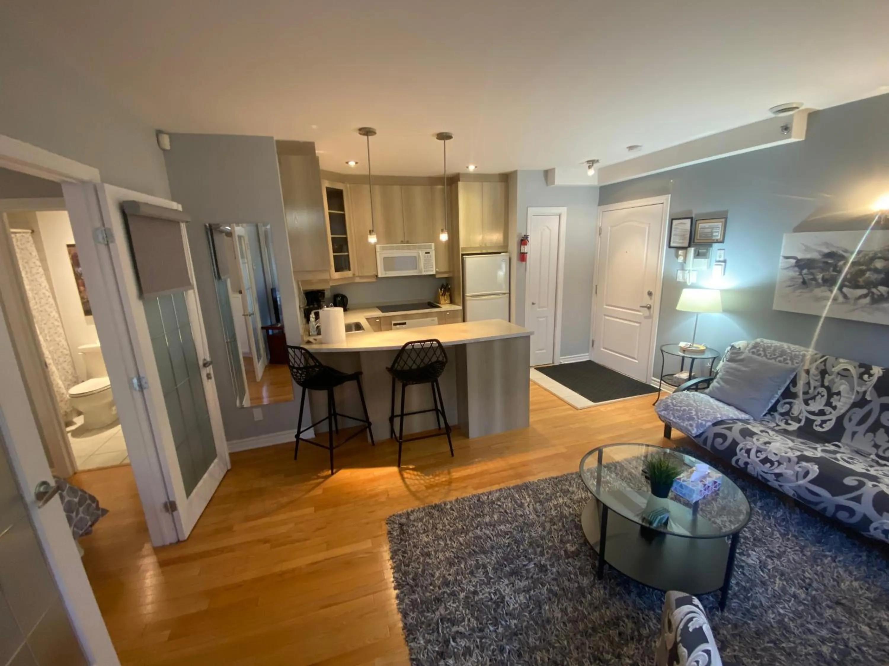 Kitchen or kitchenette in ApartHotelMontreal by Les Terrasses Saint Urbain 2225I2