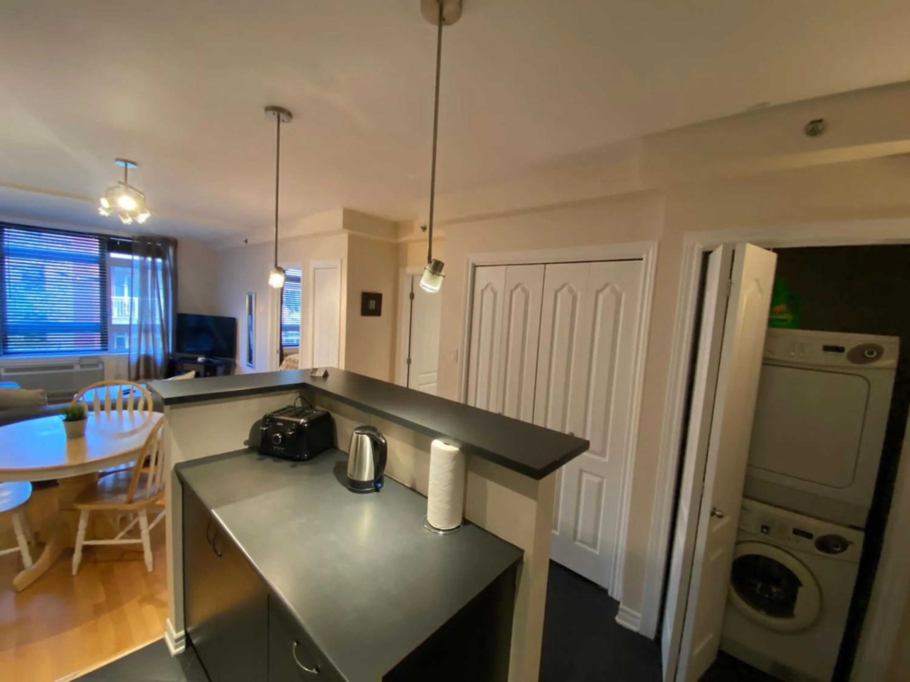 Dining area in ApartHotelMontreal by Les Terrasses Saint Urbain 2225I2