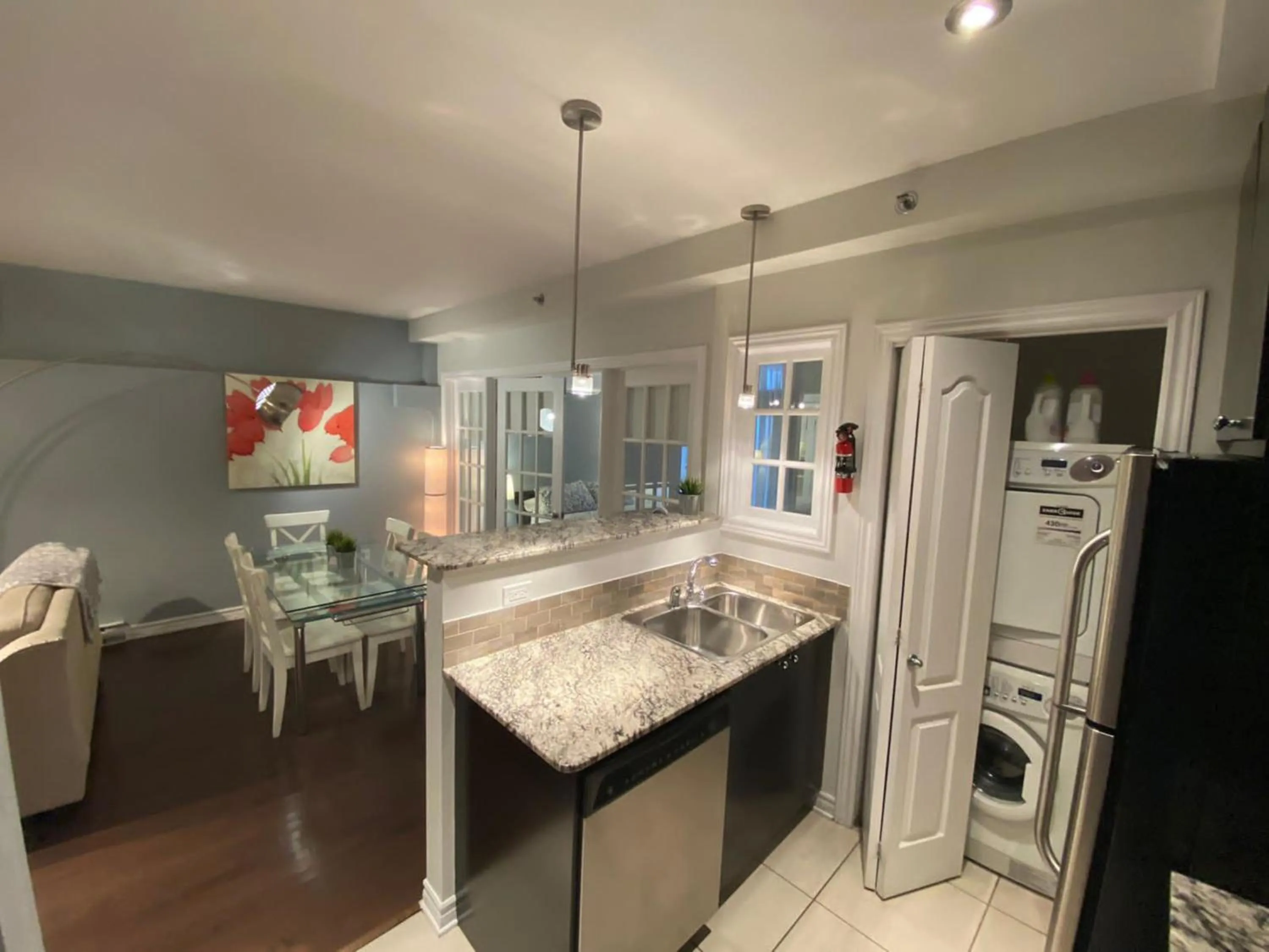 Kitchen or kitchenette in ApartHotelMontreal by Les Terrasses Saint Urbain 2225I2