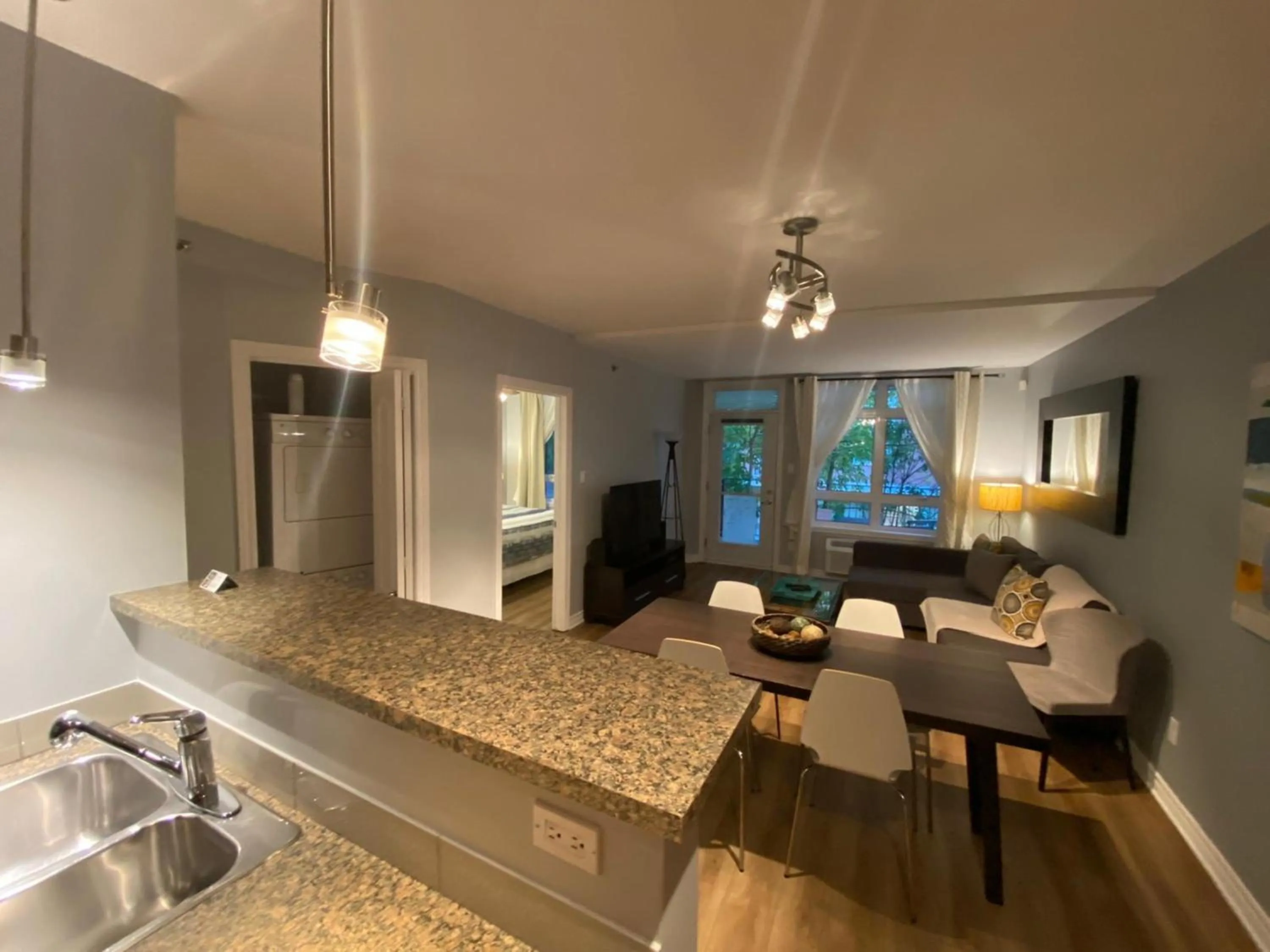 Living room in ApartHotelMontreal by Les Terrasses Saint Urbain 2225I2