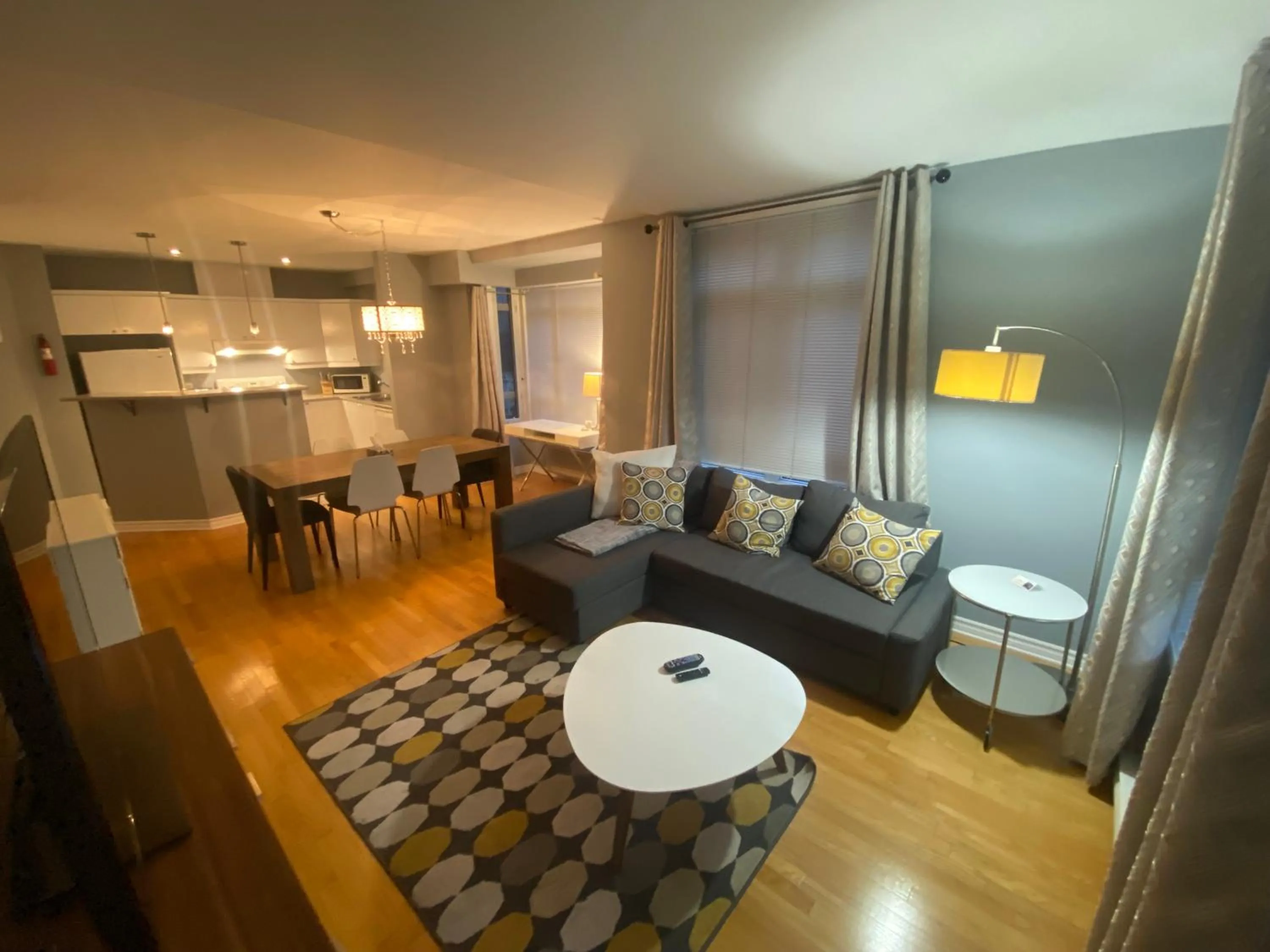 Living room in ApartHotelMontreal by Les Terrasses Saint Urbain 2225I2