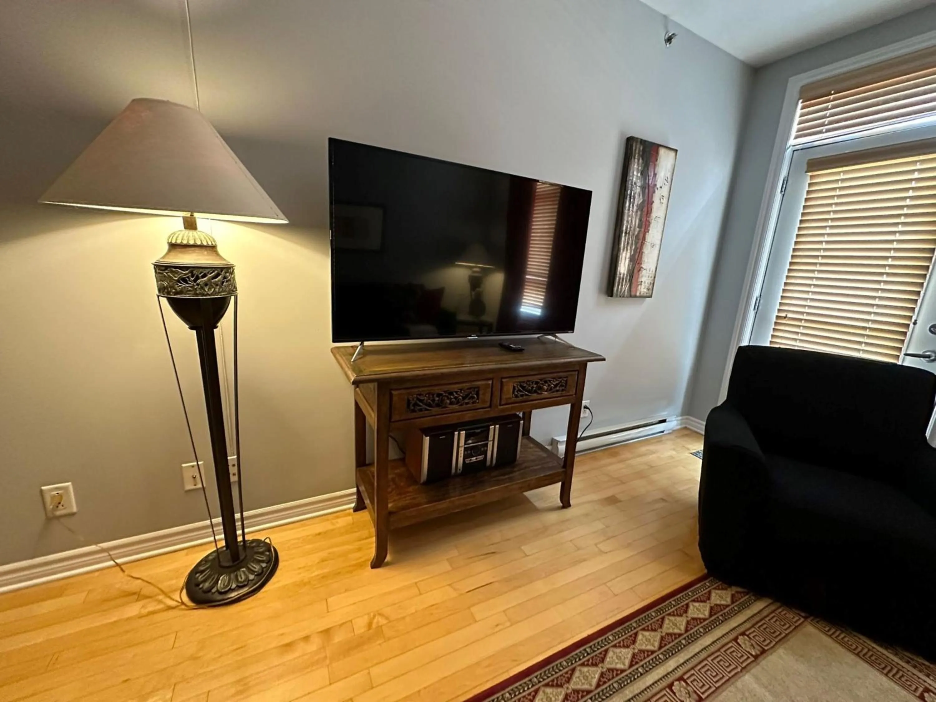TV and multimedia in ApartHotelMontreal by Les Terrasses Saint Urbain 2225I2