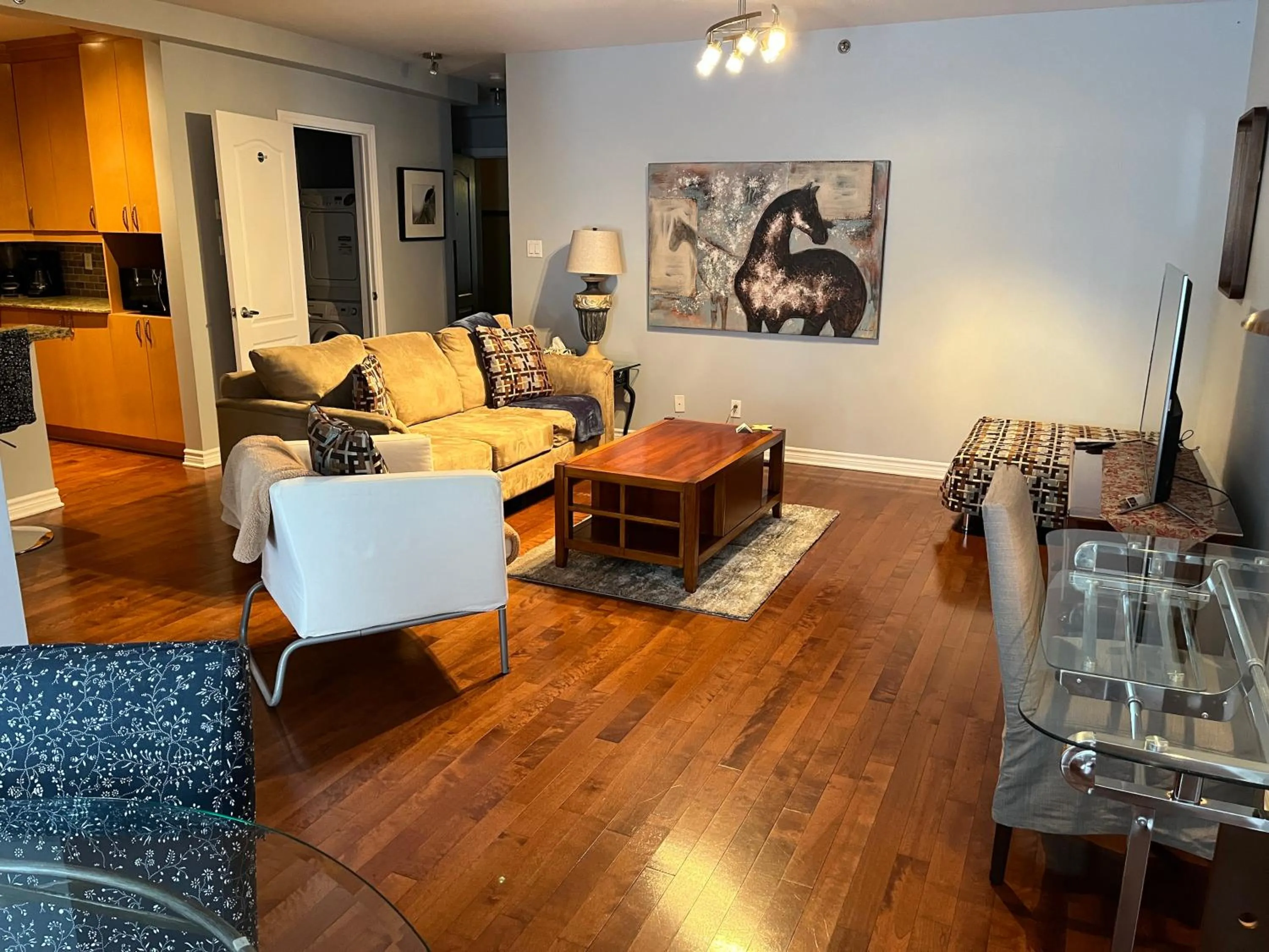 Living room in ApartHotelMontreal by Les Terrasses Saint Urbain 2225I2