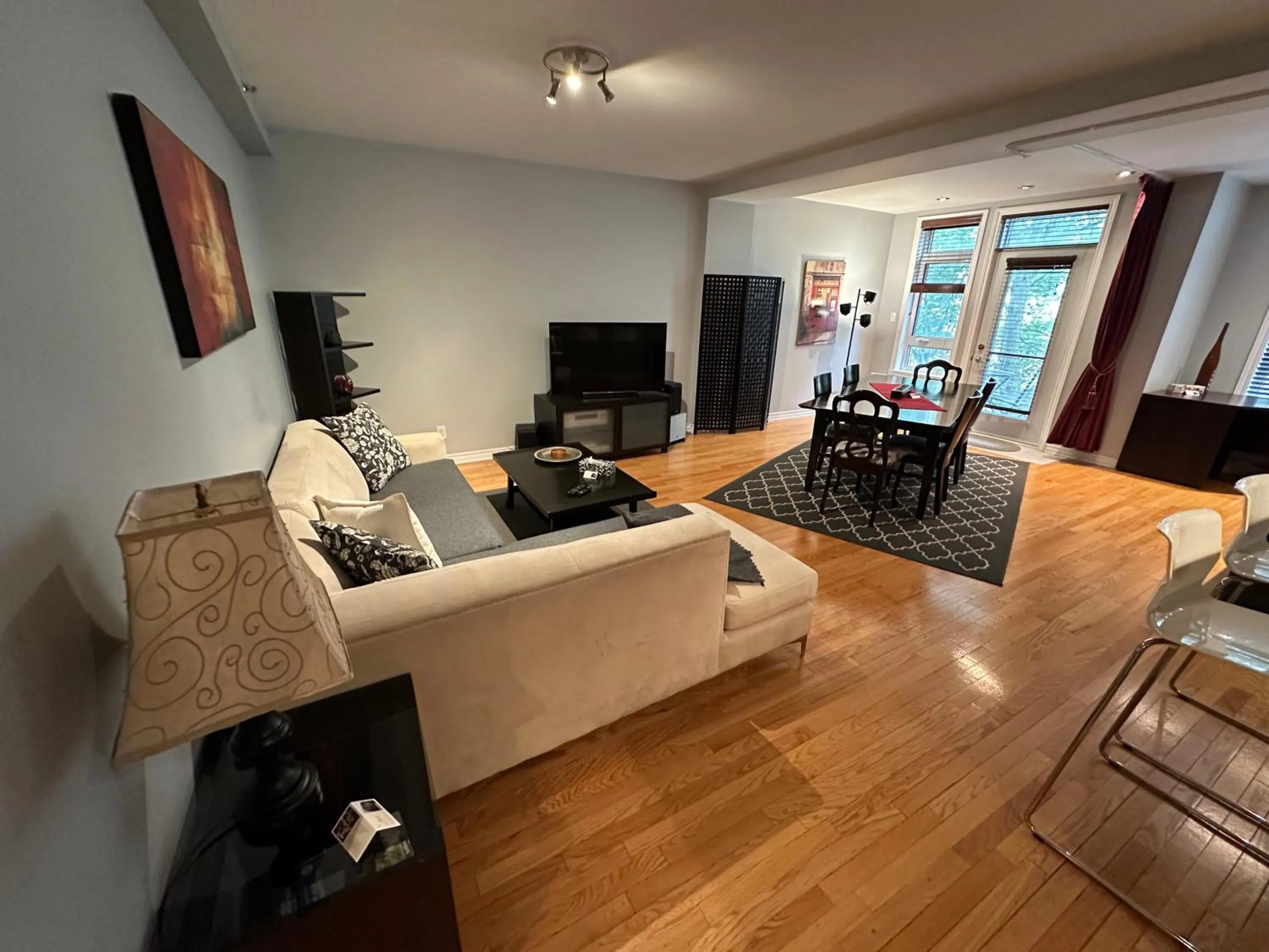 Living room in ApartHotelMontreal by Les Terrasses Saint Urbain 2225I2