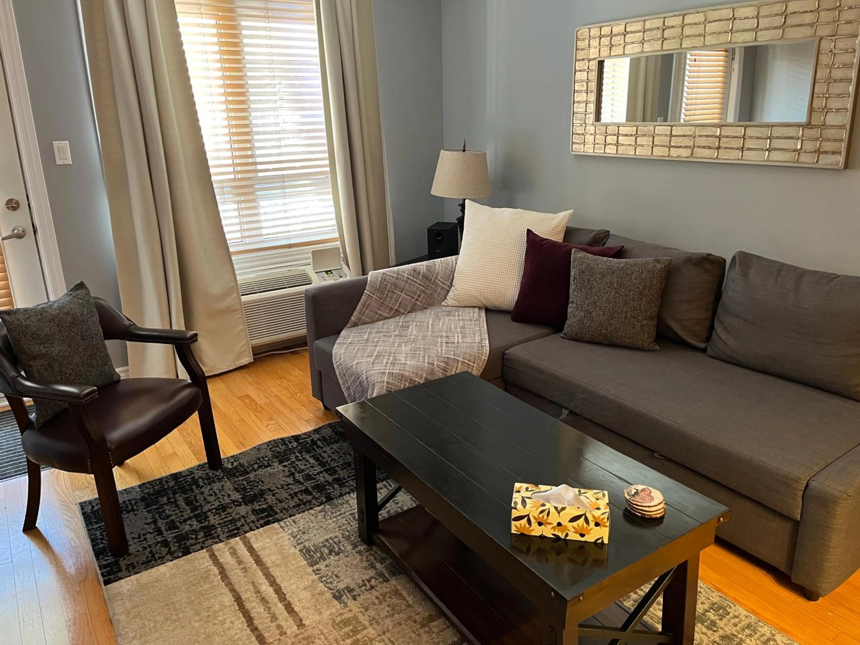 Living room in ApartHotelMontreal by Les Terrasses Saint Urbain 2225I2