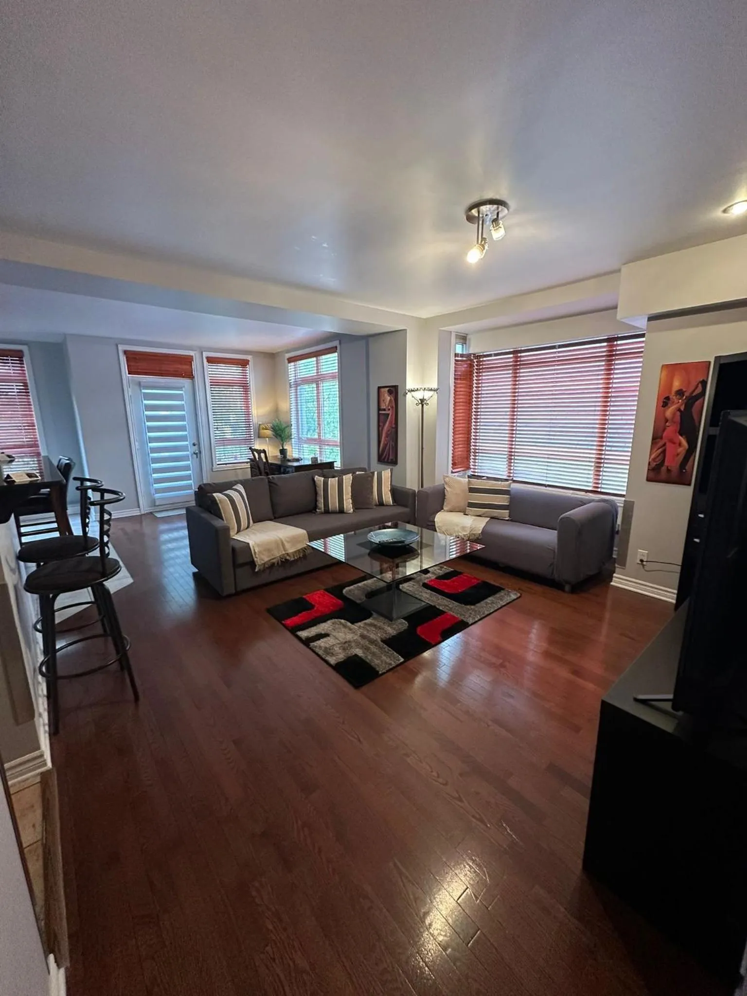 Living room in ApartHotelMontreal by Les Terrasses Saint Urbain 2225I2