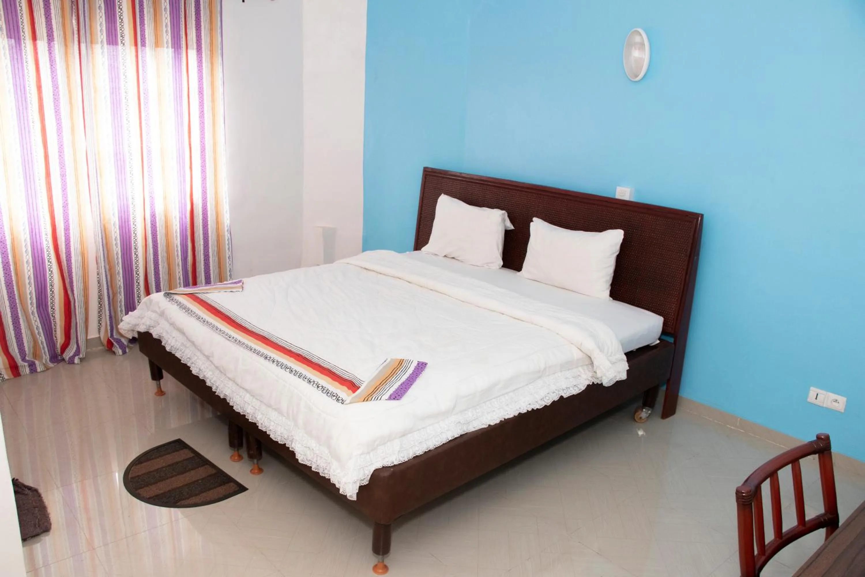 Bed in Alafia Hotel Ketou