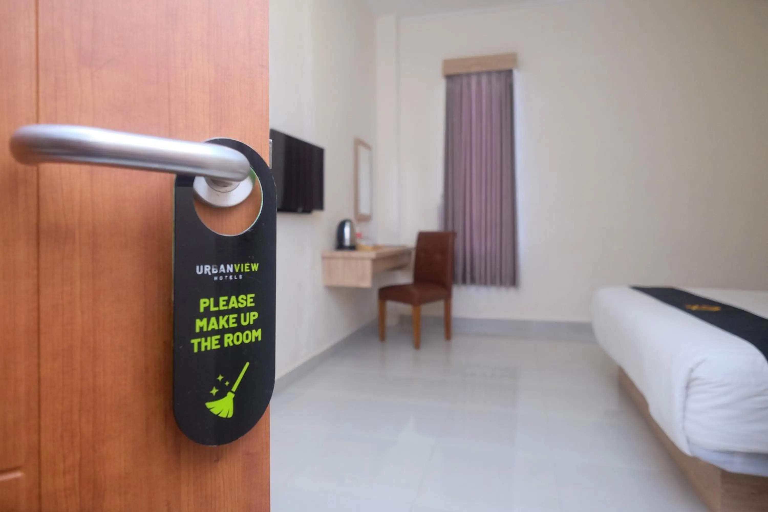 Bed in Urbanview Hotel DJ Inn Tegal