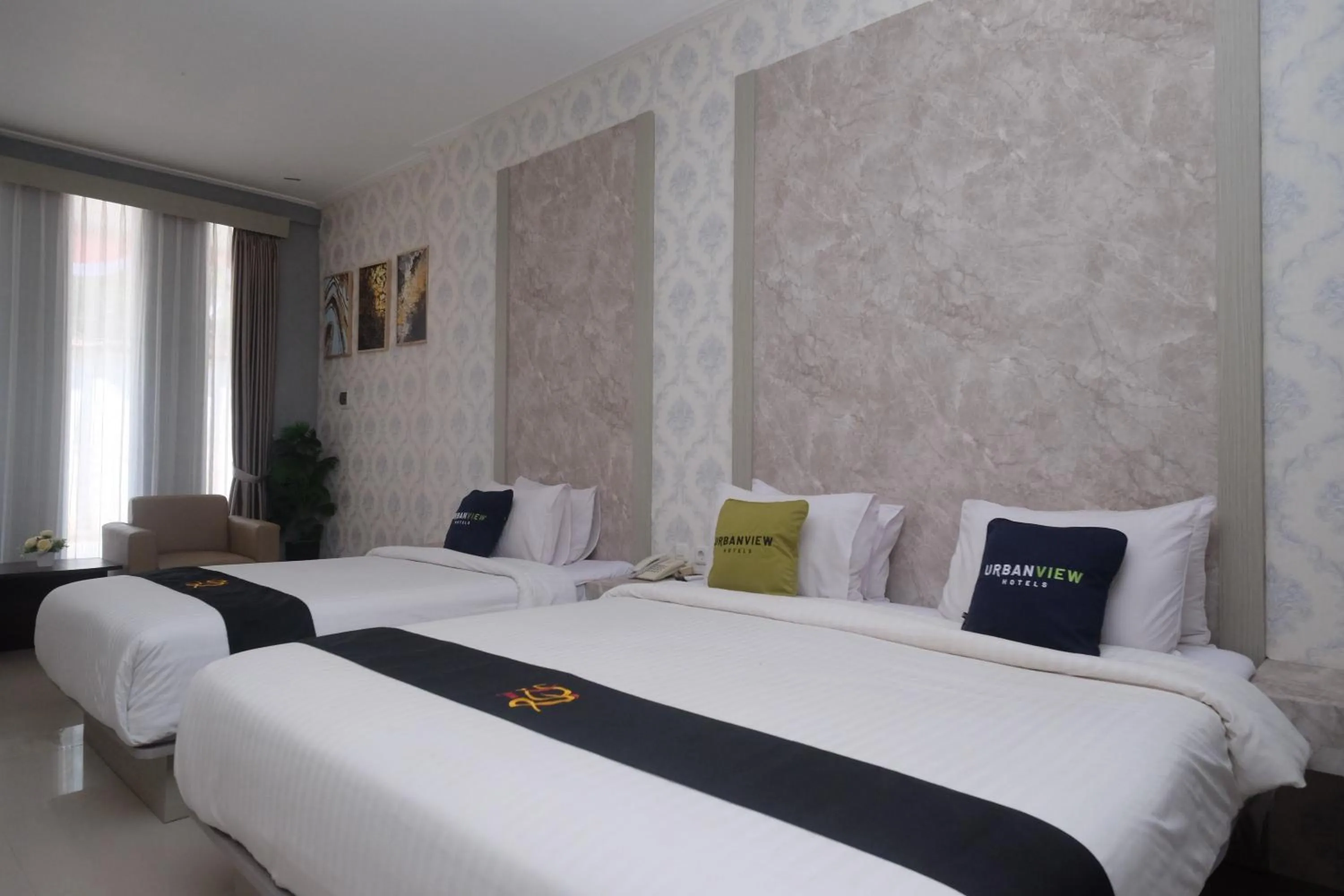 Bed in Urbanview Hotel DJ Inn Tegal