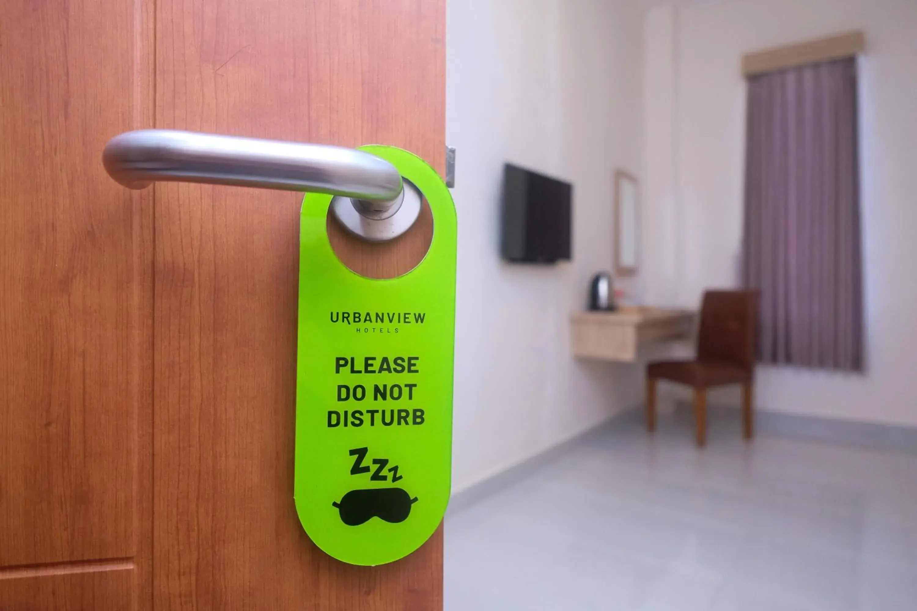 Bedroom in Urbanview Hotel DJ Inn Tegal Bedroom in Urbanview Hotel DJ Inn Tegal