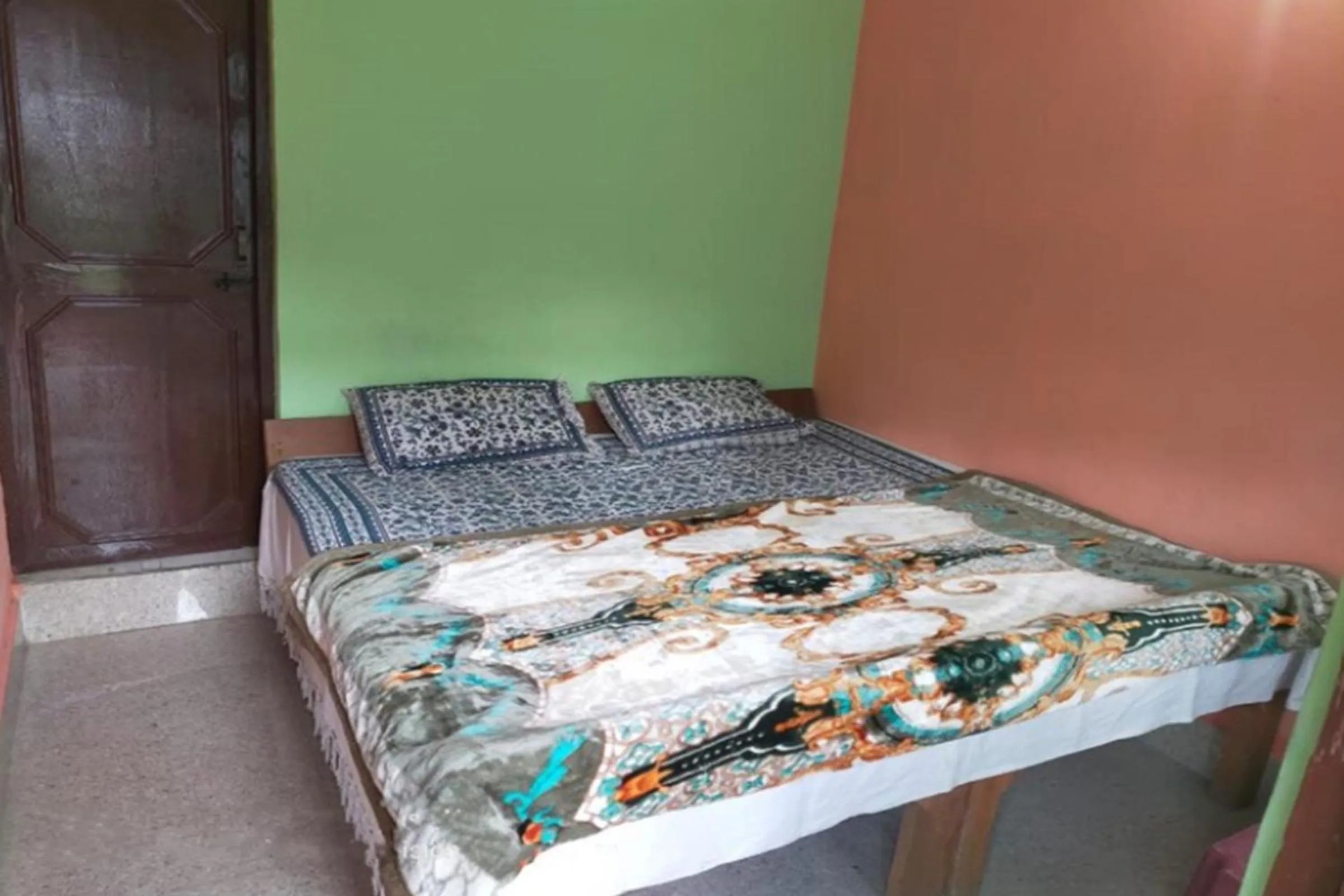 Bed in Mamta Palace by StayApart