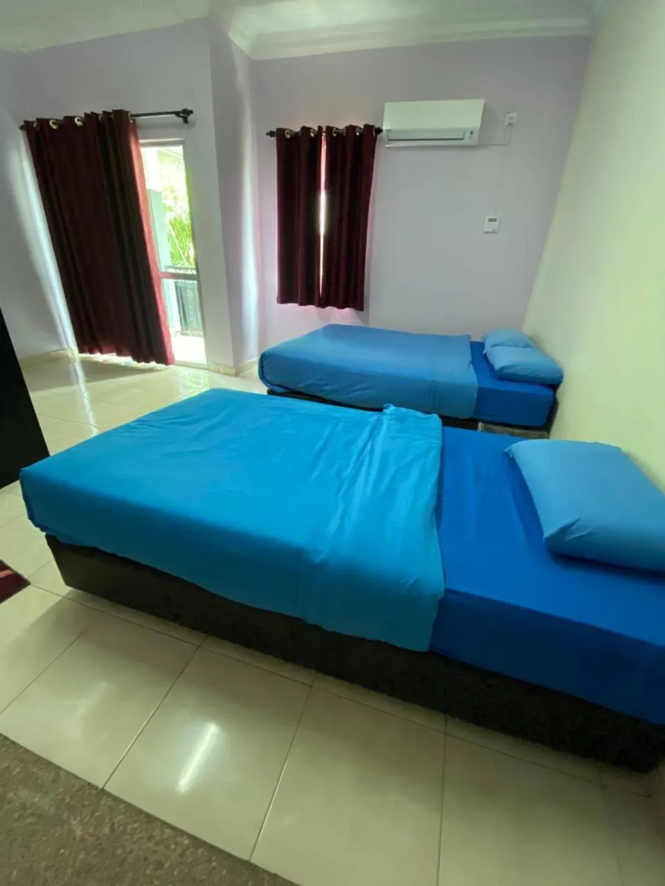 Bed in Kapas Coral Beach Resort