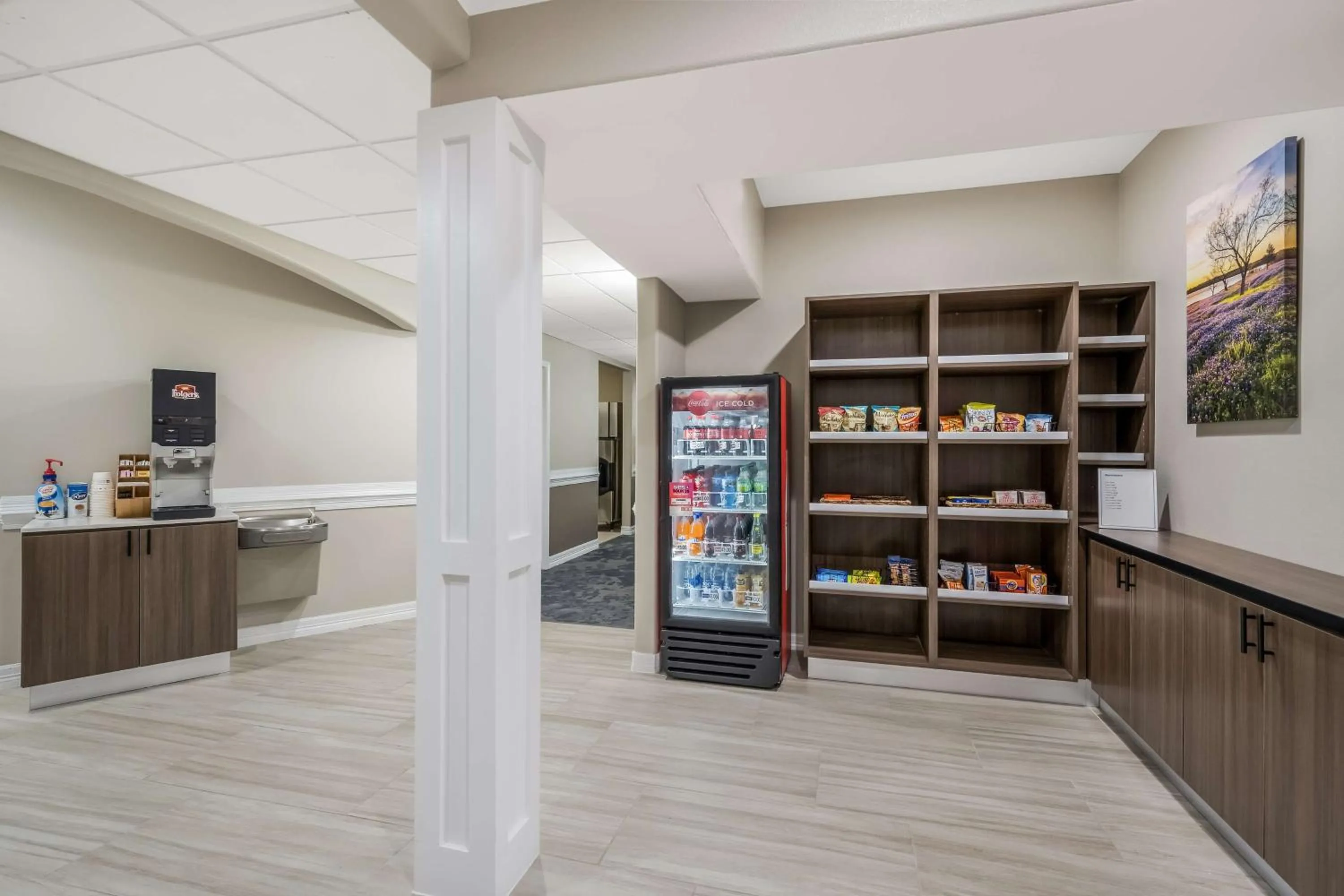 Property building in SureStay Studio by Best Western Conroe Downtown