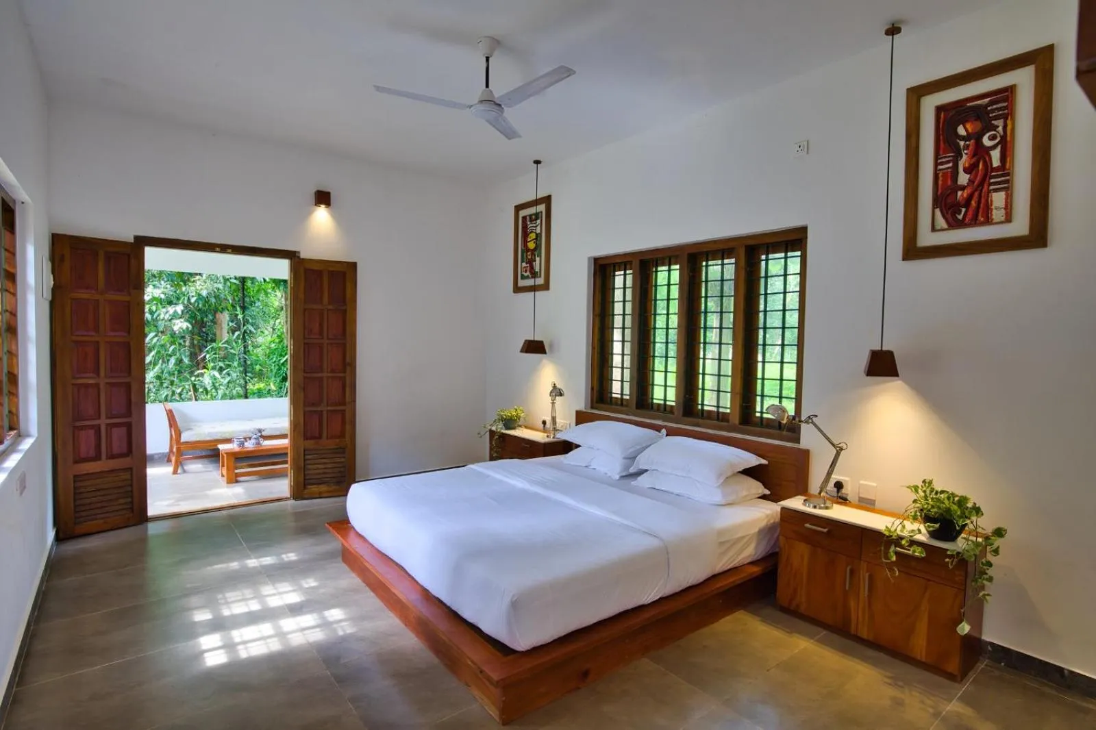 Bed in Softouch Ayurveda Village Kerala