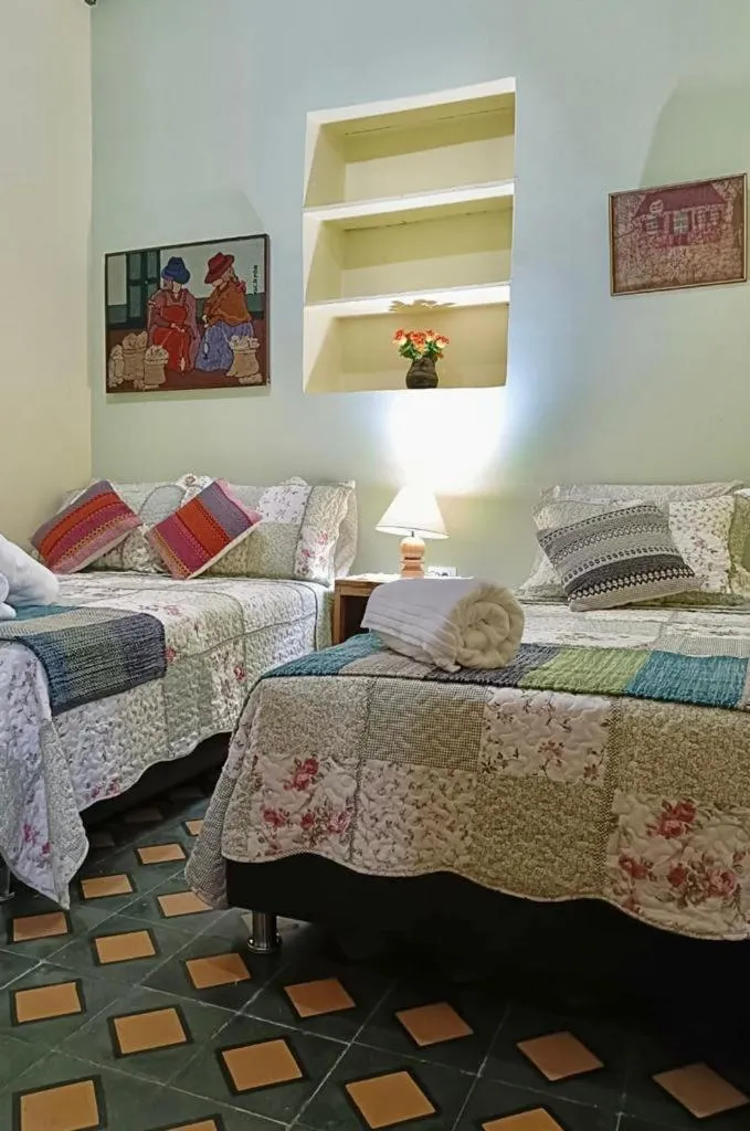 Bed in Posada Las Bromelias