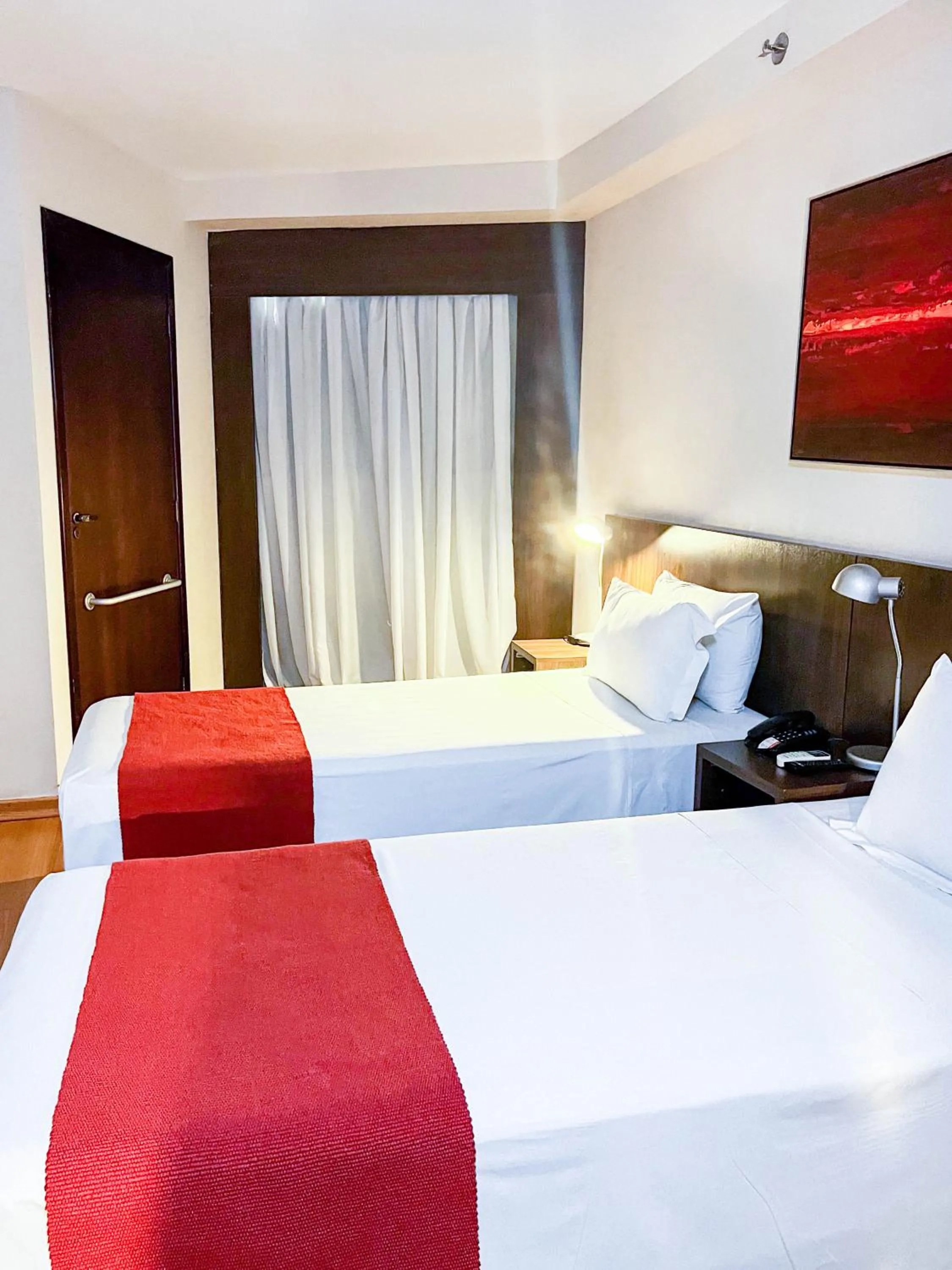 Bed in Royal Design Savassi Hotel