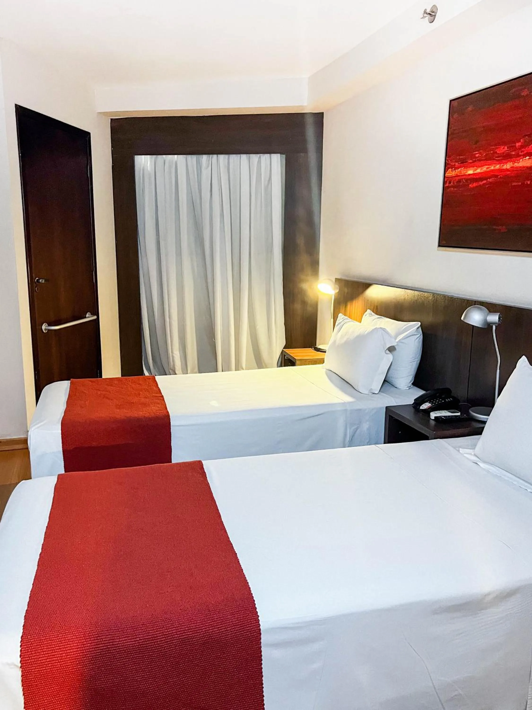 Bed in Royal Design Savassi Hotel