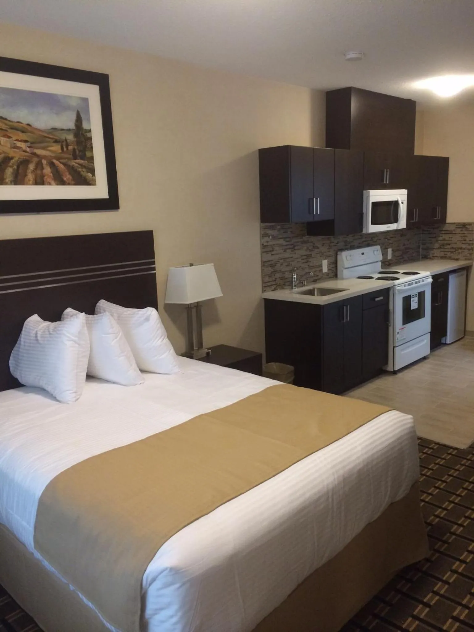 Bed in Super 8 by Wyndham Watrous