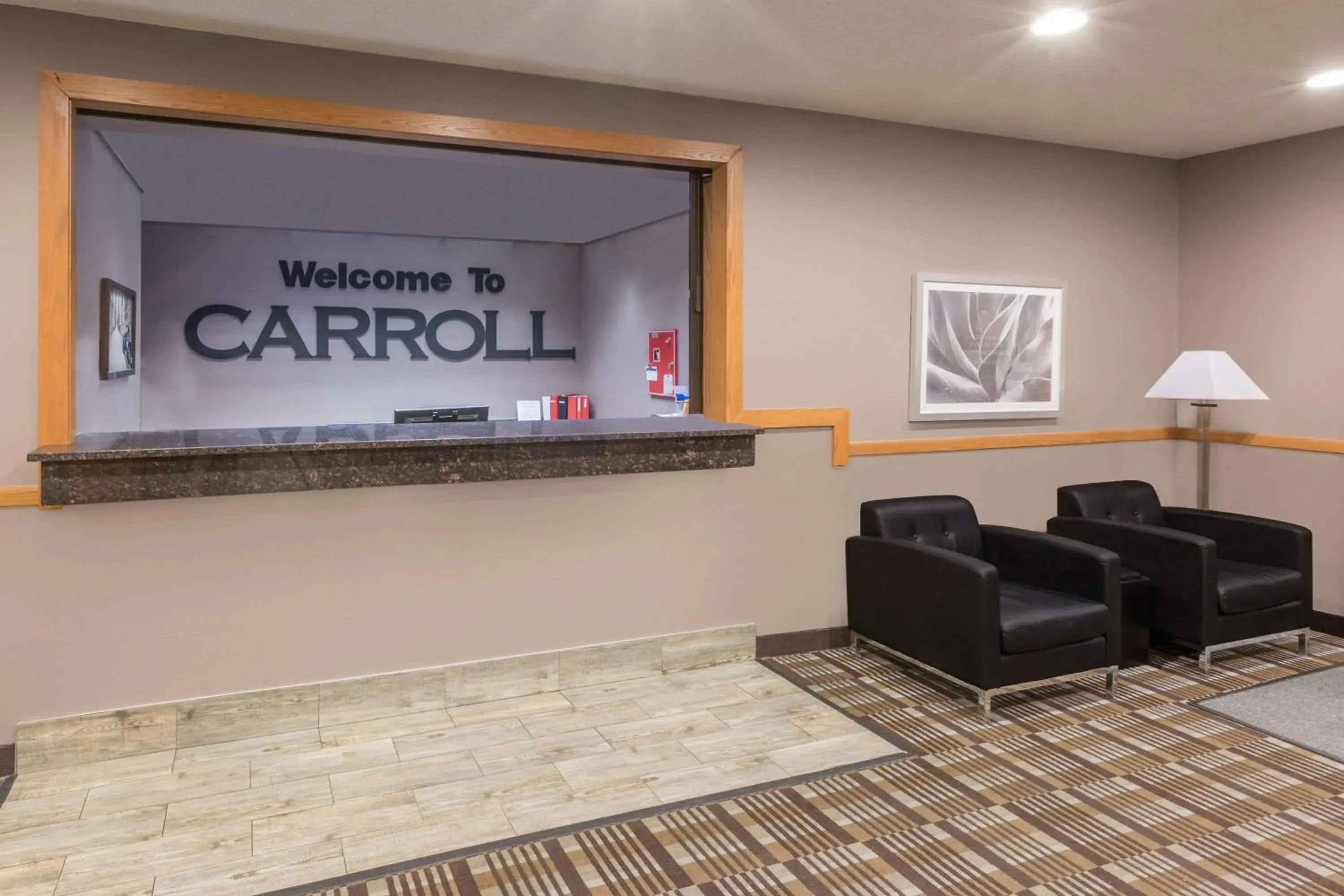Lobby or reception in Super 8 by Wyndham Carroll/East Lobby or reception in Super 8 by Wyndham Carroll/East