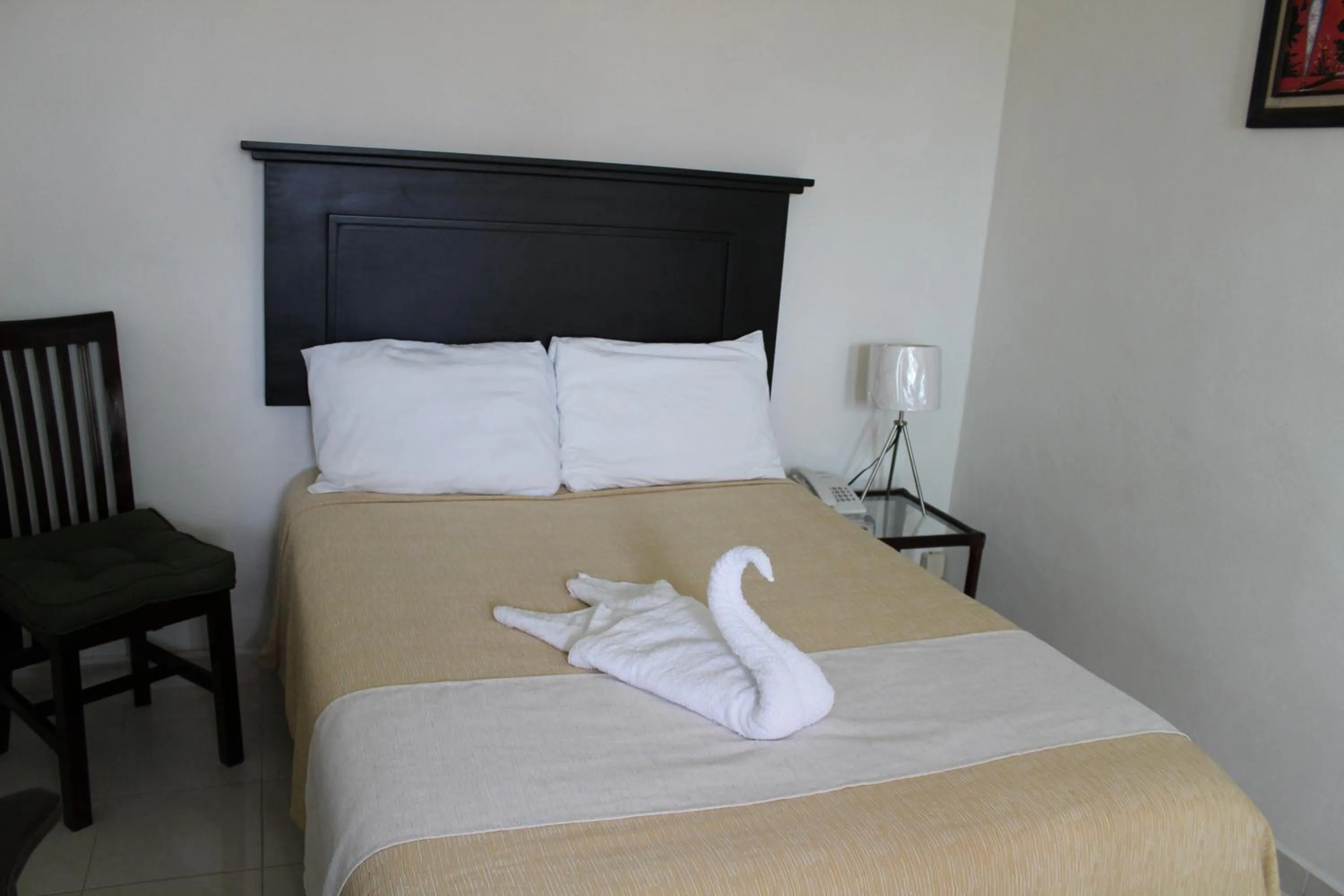 Bed in Hotel Malecón