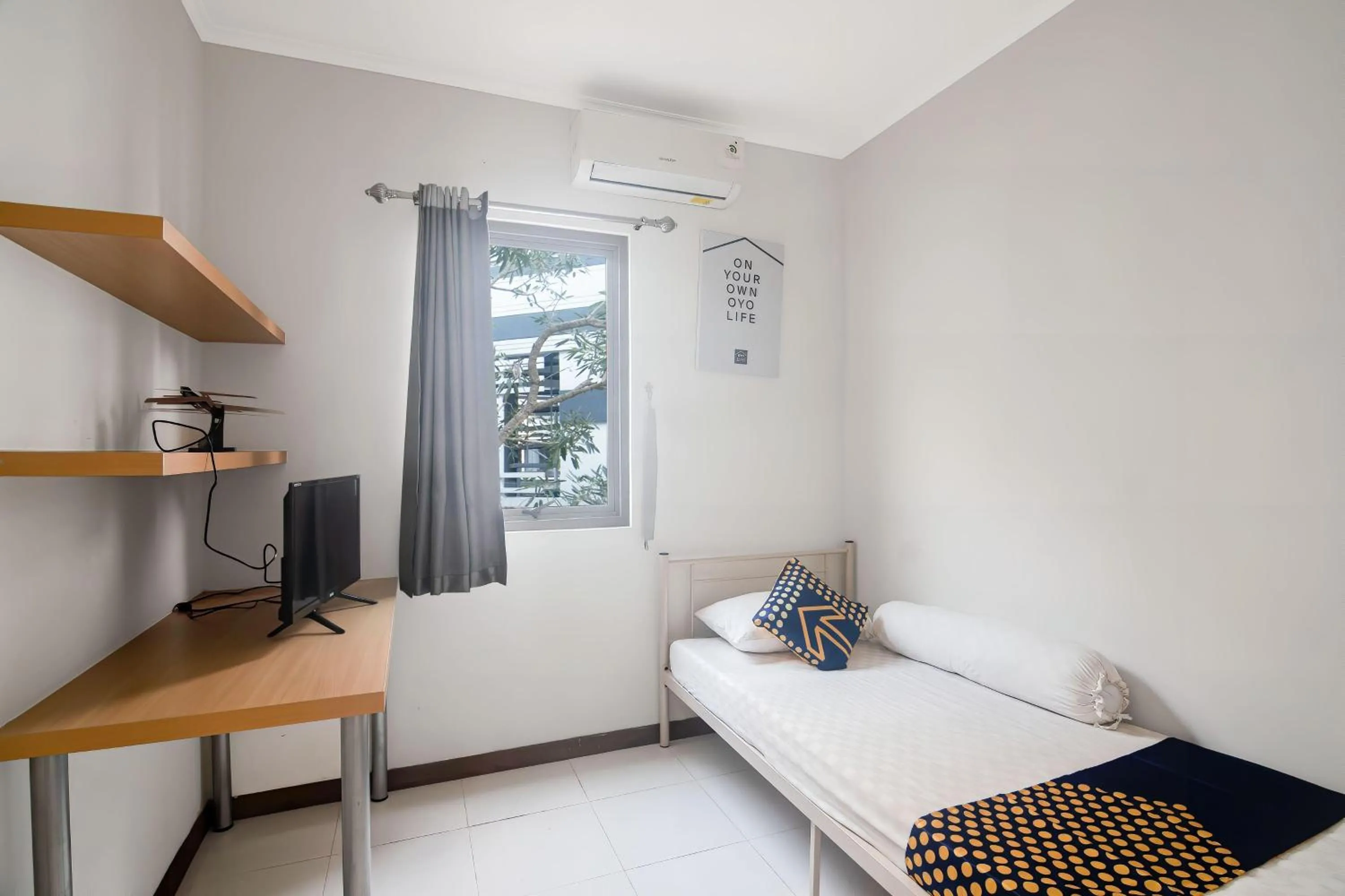 Bedroom in Hotel O Anartha Residence