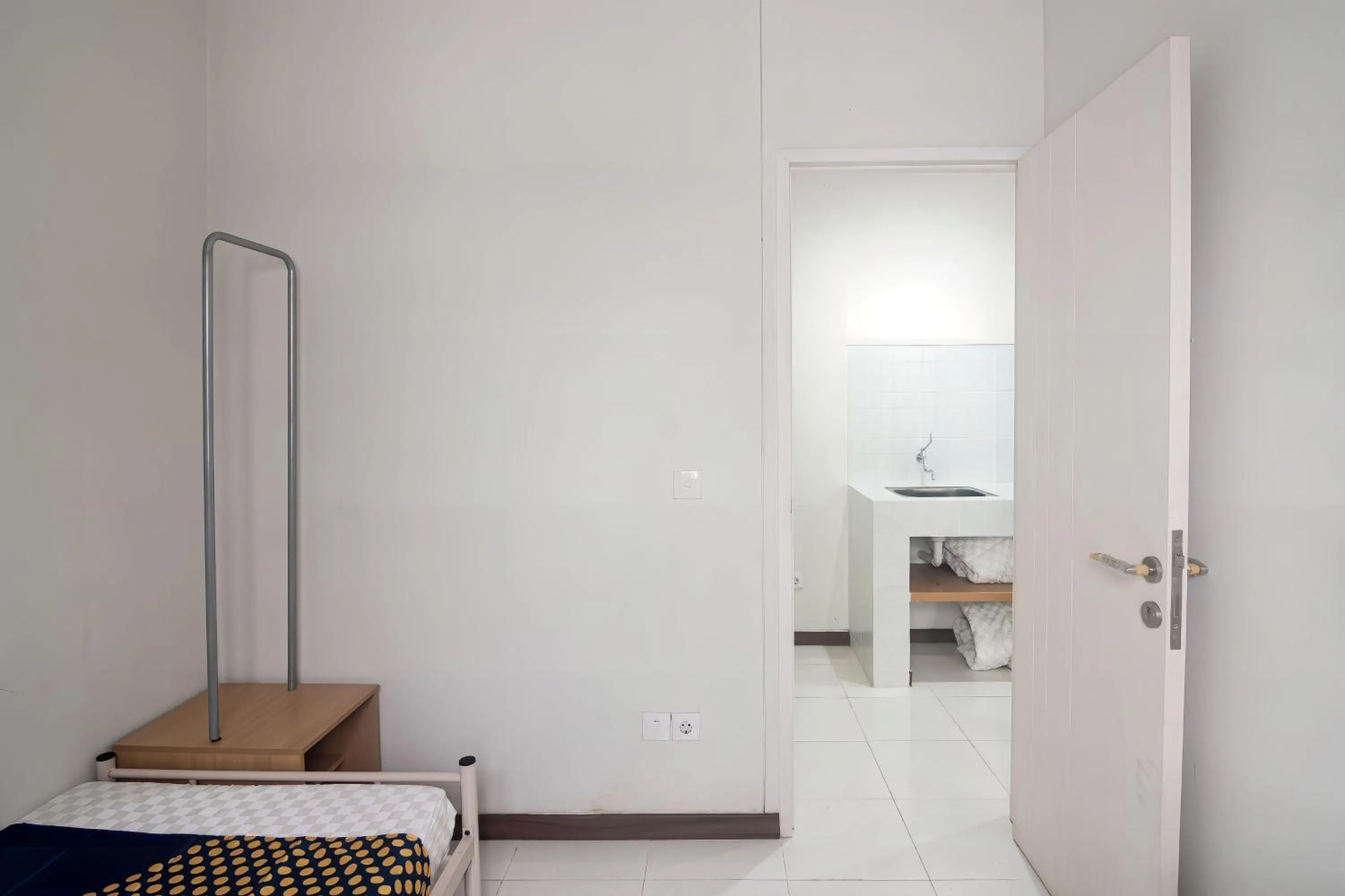 Bedroom in Hotel O Anartha Residence