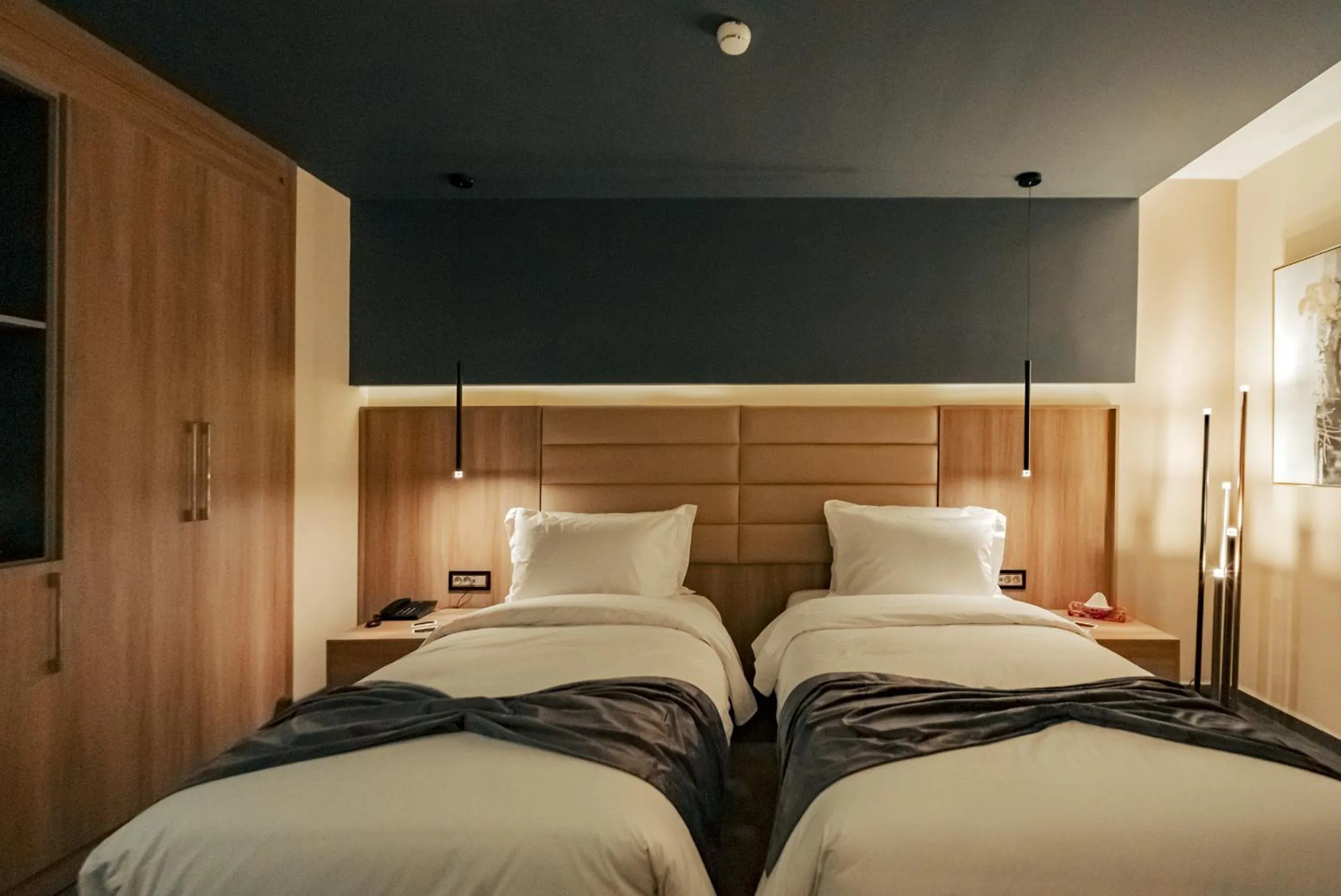 Bed in AD HOTEL HYDRA