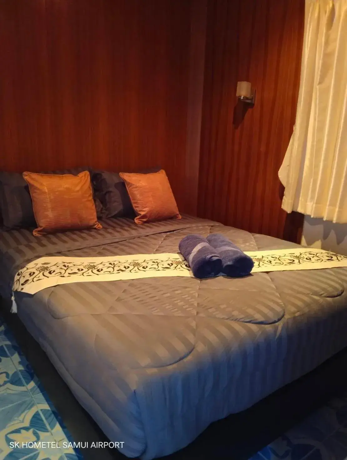 Bed in SK Hometel Samui Airport Bed in SK Hometel Samui Airport