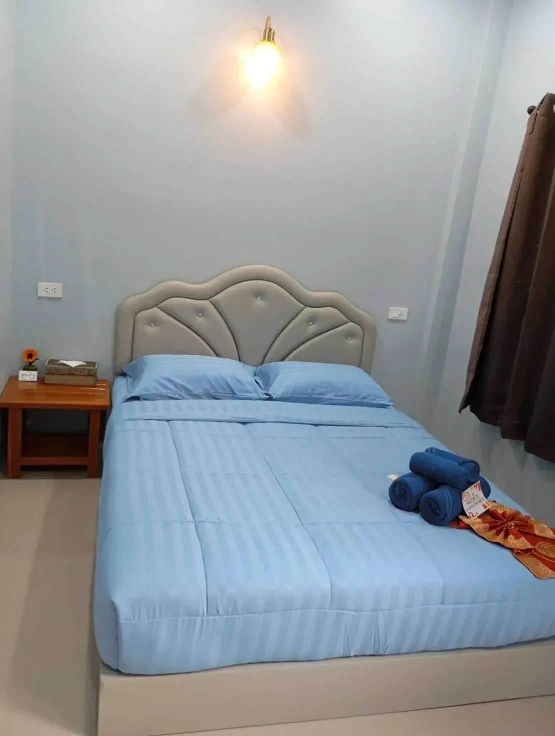 Bed in SK Hometel Samui Airport Bed in SK Hometel Samui Airport