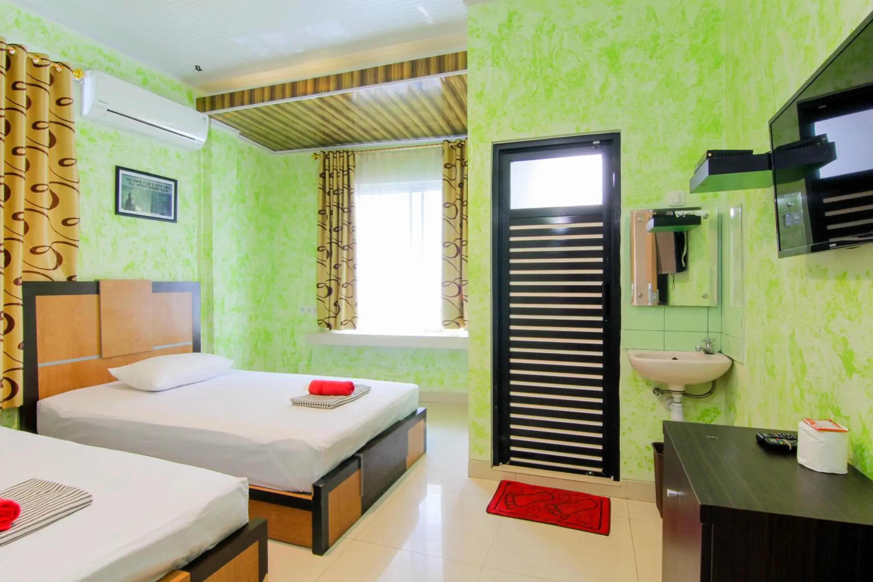 Photo of the whole room, Bed in Yani Homestay Photo of the whole room, Bed in Yani Homestay