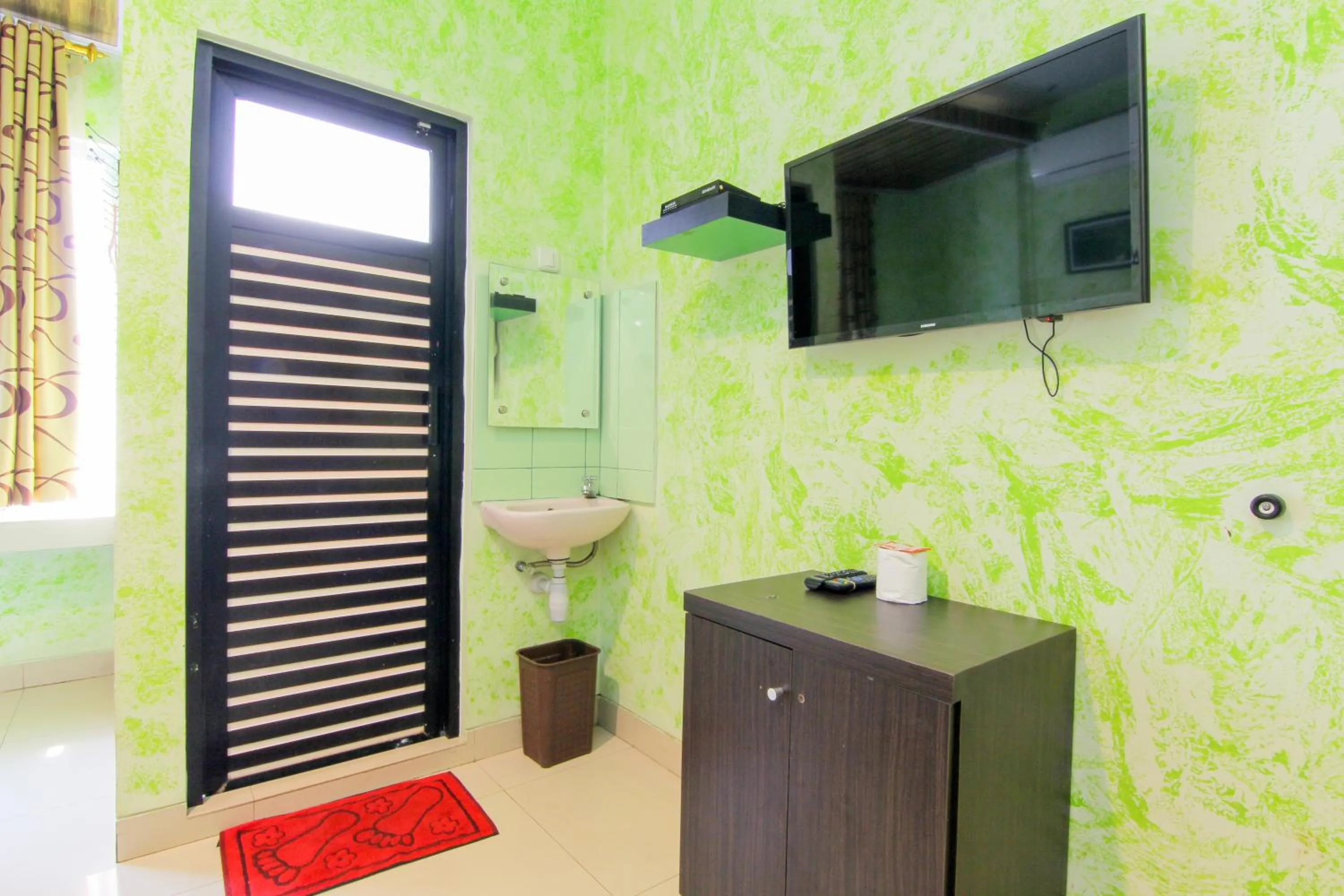 TV and multimedia in Yani Homestay