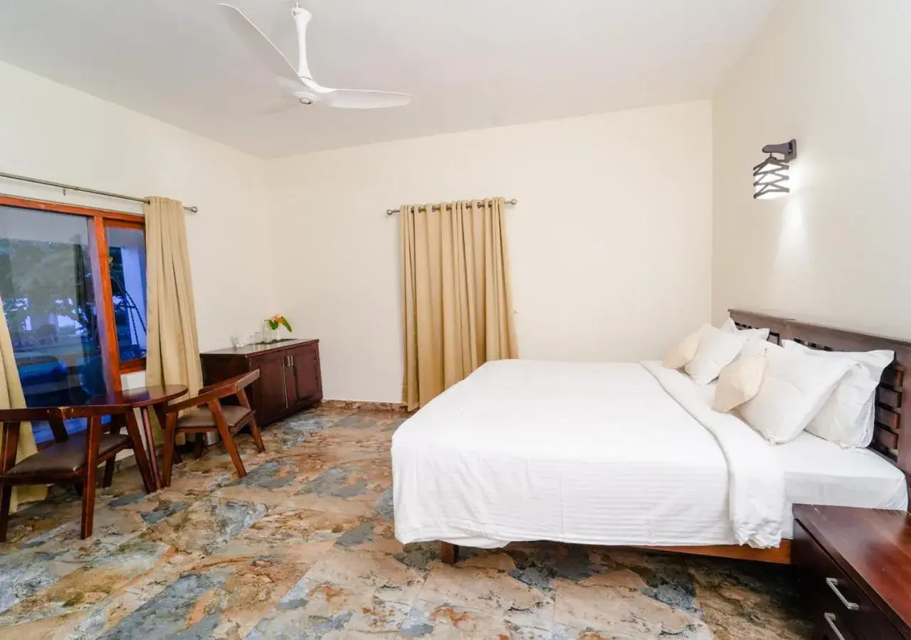 Photo of the whole room, Bed in Solaris Beach View Resort & Spa by VOYE HOMES Photo of the whole room, Bed in Solaris Beach View Resort & Spa by VOYE HOMES