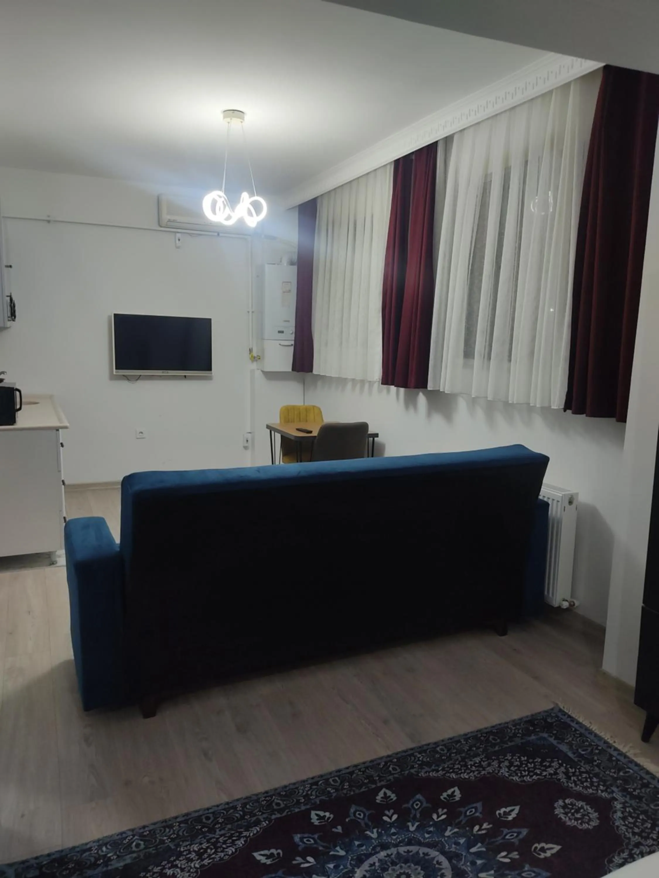 Living room, Bed in istanbul airport family suites hotel