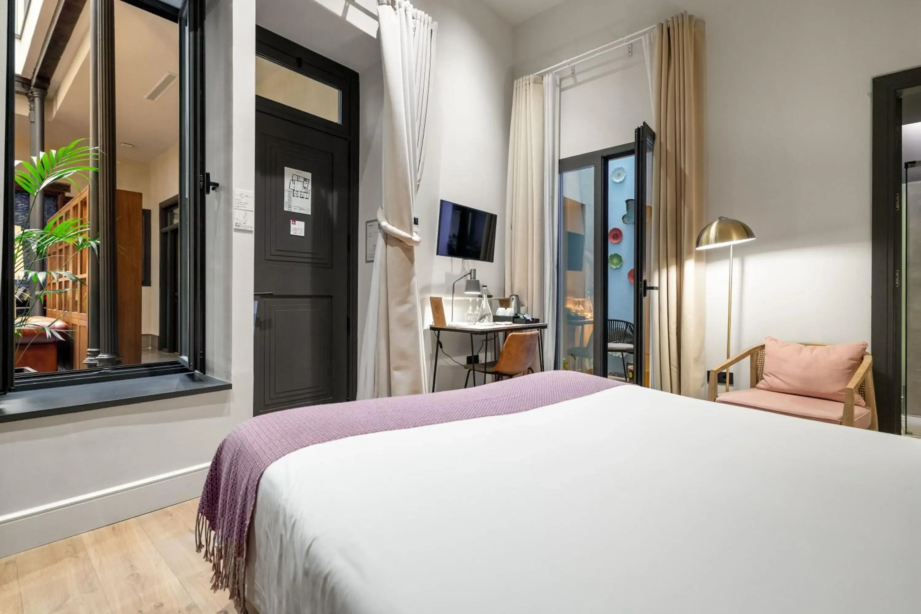 Bed in Casa Alhaja by Shiadu Bed in Casa Alhaja by Shiadu