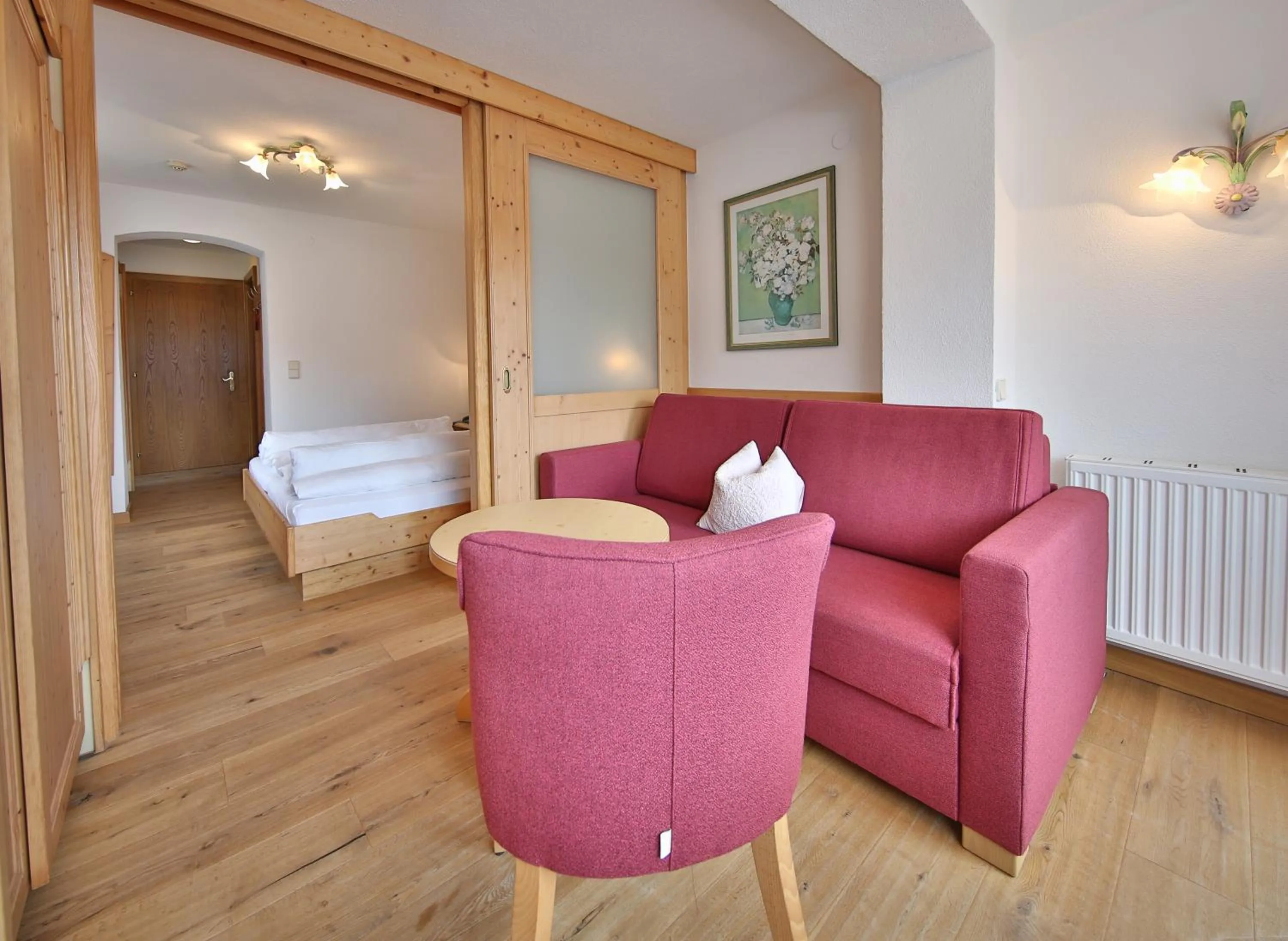 Living room, Bed in Hotel Astoria