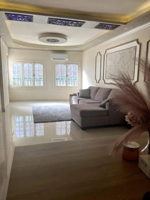 Living room in Beachside Bliss: Just Steps from the Shore