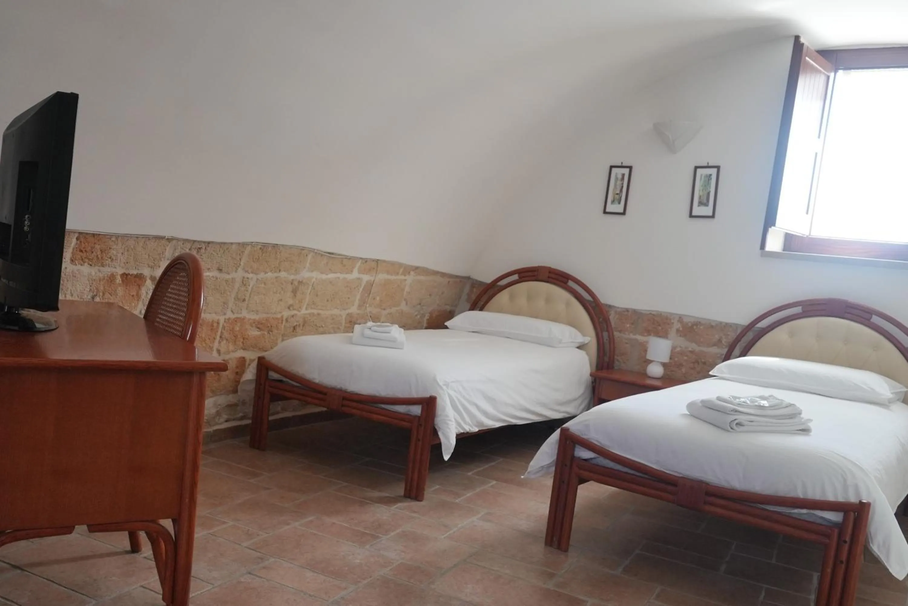 Bed in B&B Donna Luisa