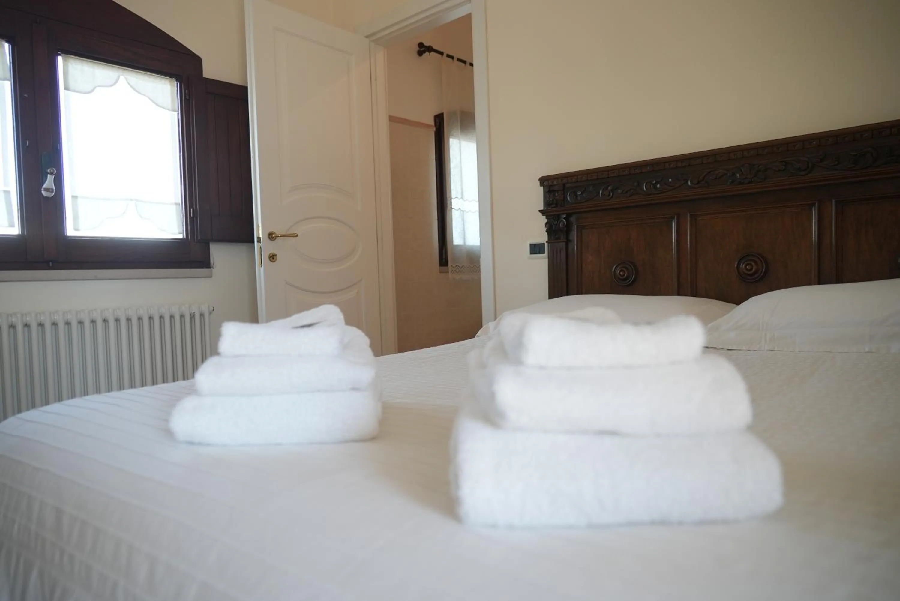 Bed in B&B Donna Luisa