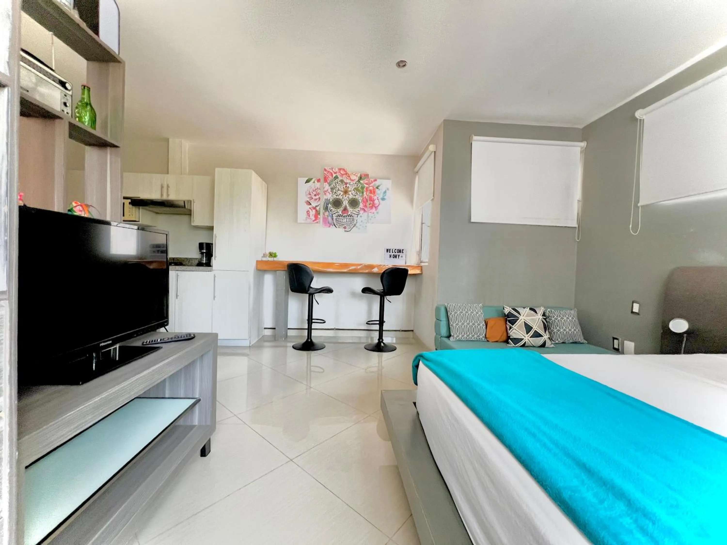 Bed in Playa Centro Rooftop Apartments & Studios