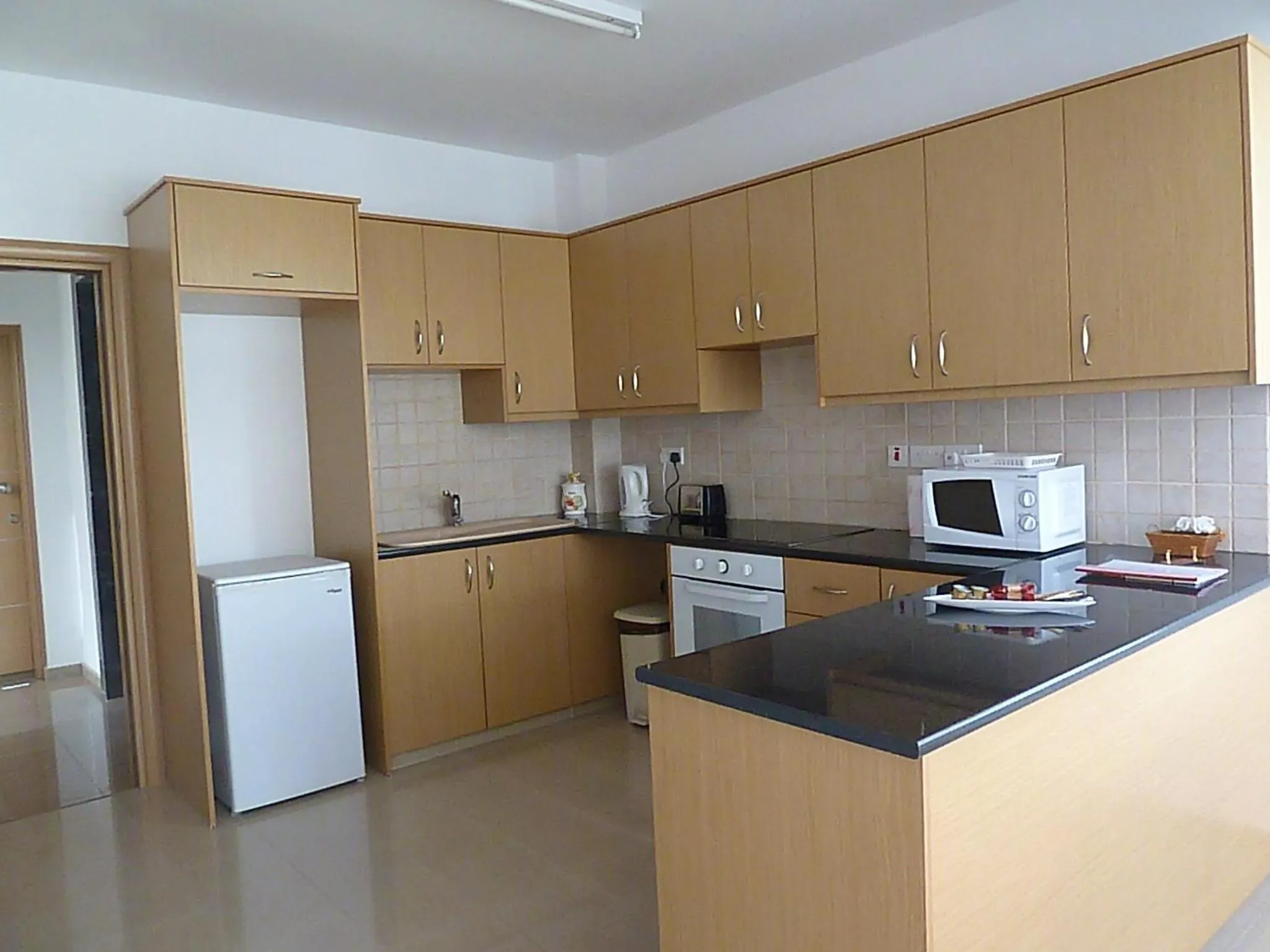 Kitchen or kitchenette in Valentinos Apartments
