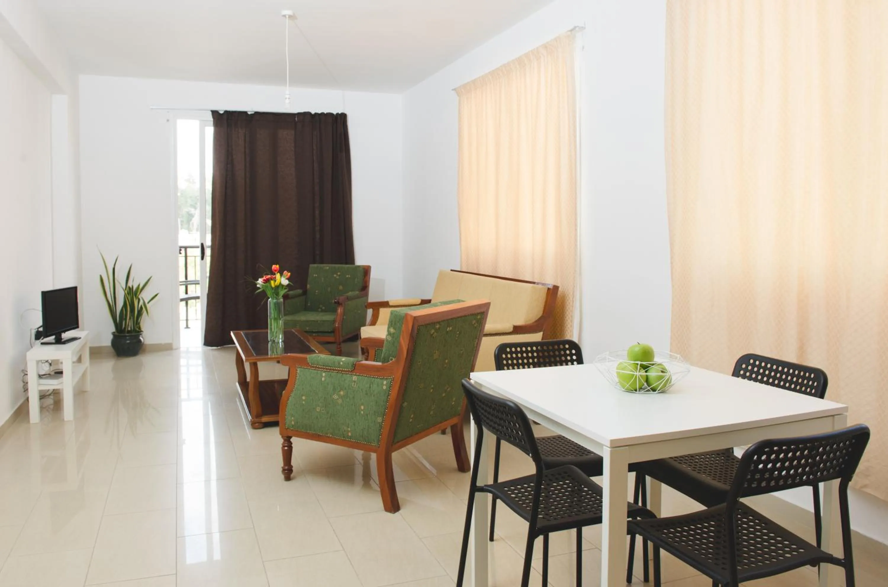 Seating area in Valentinos Apartments