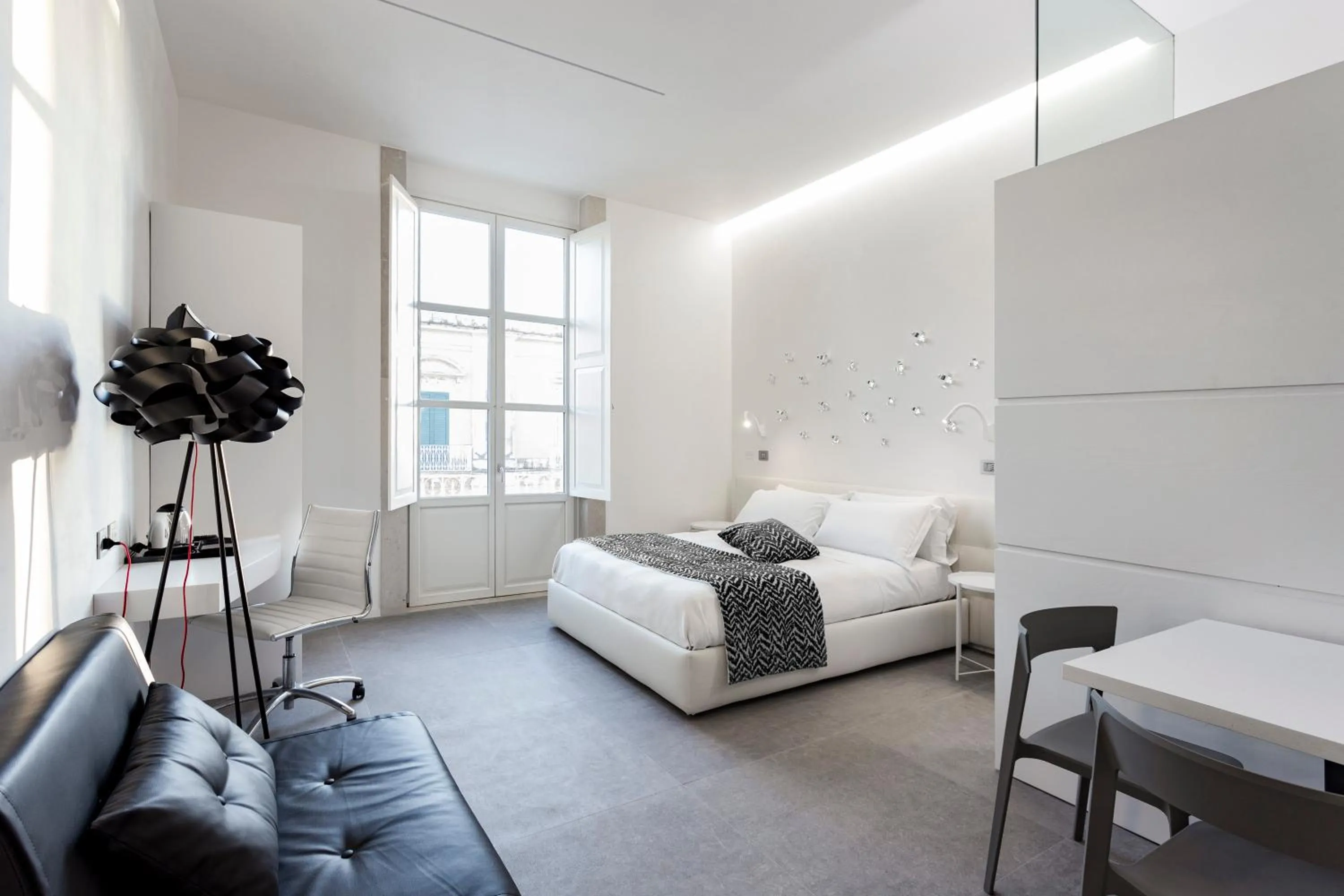 Bed in Nostos rooms & Apartments