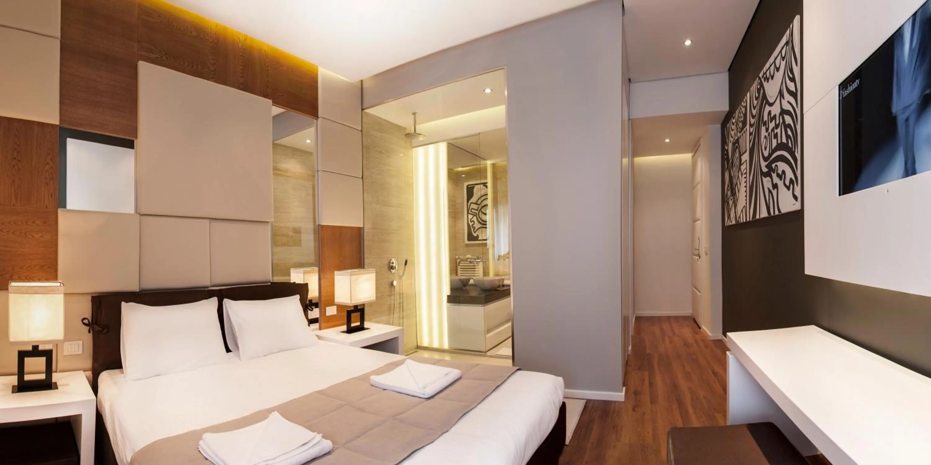 Bed in Eden Garden Suites