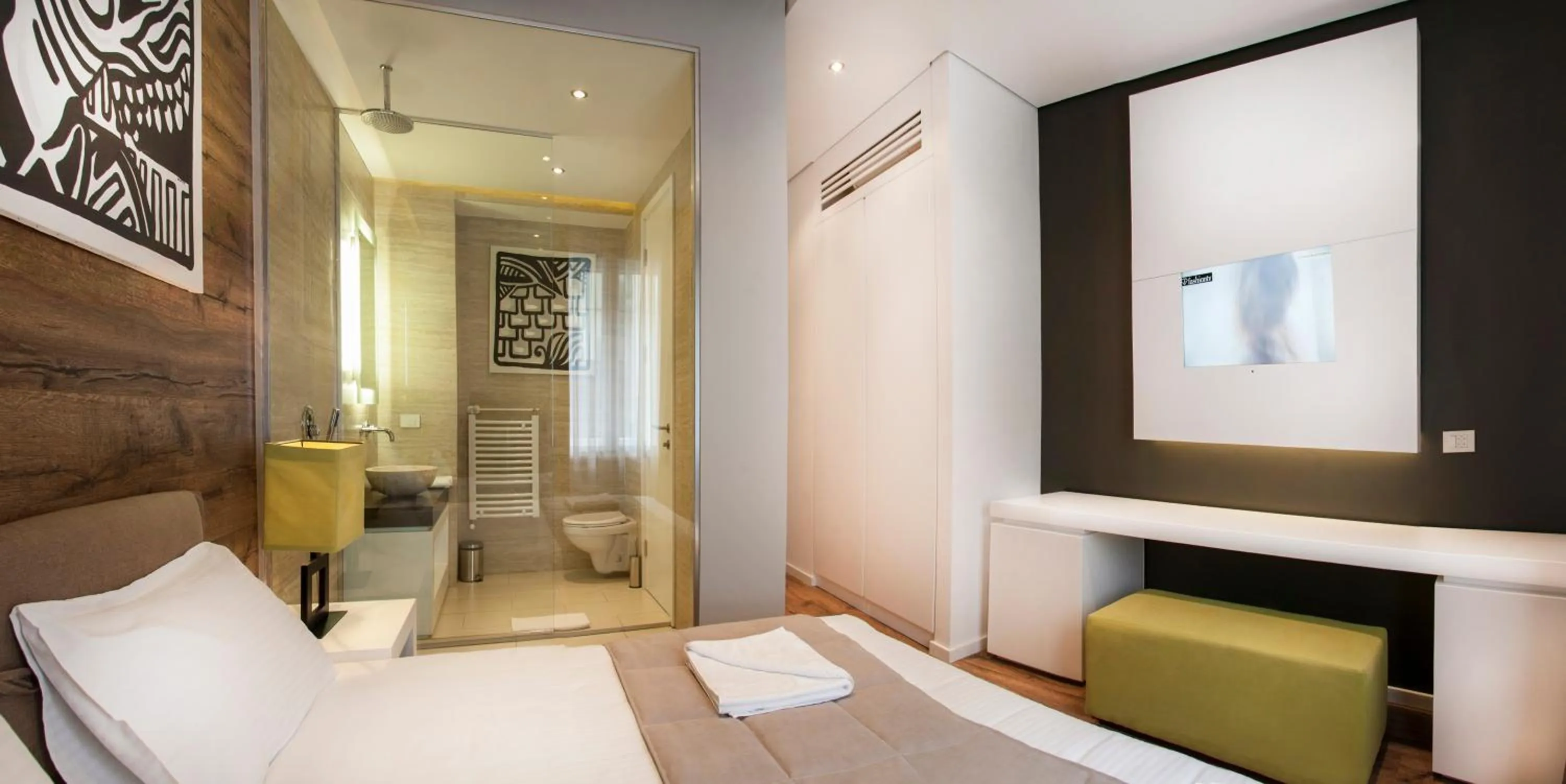 Bed in Eden Garden Suites