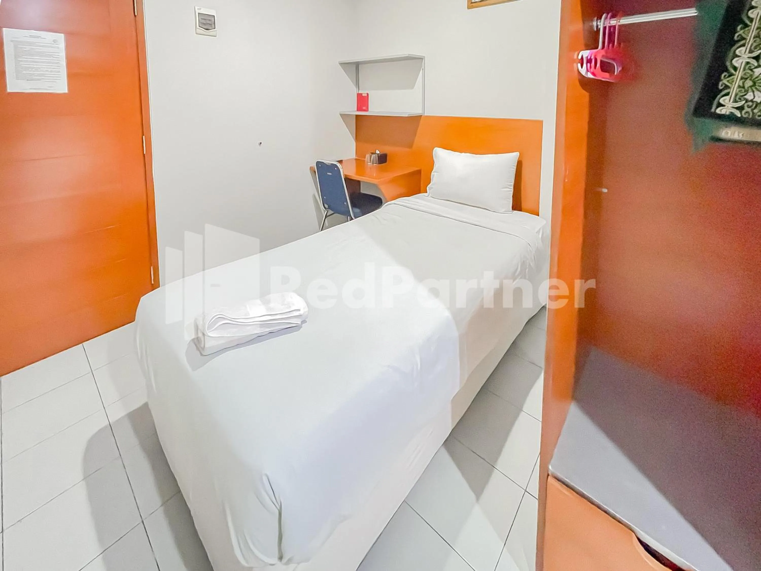 Bedroom in Sang Surya GuestHouse Syariah Near RS Hasan Sadikin Mitra RedDoorz