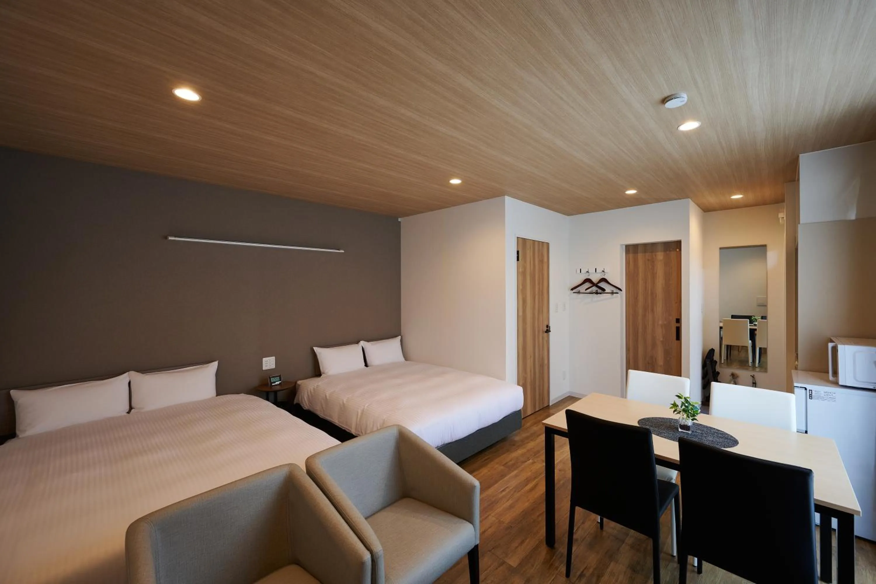 Photo of the whole room, Bed in HOTEL R9 The Yard Kasai