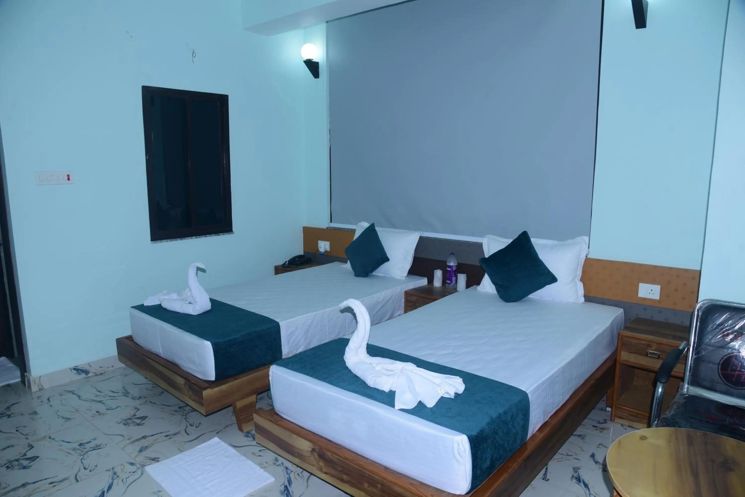 Bed in Hotel Gridhakuta International